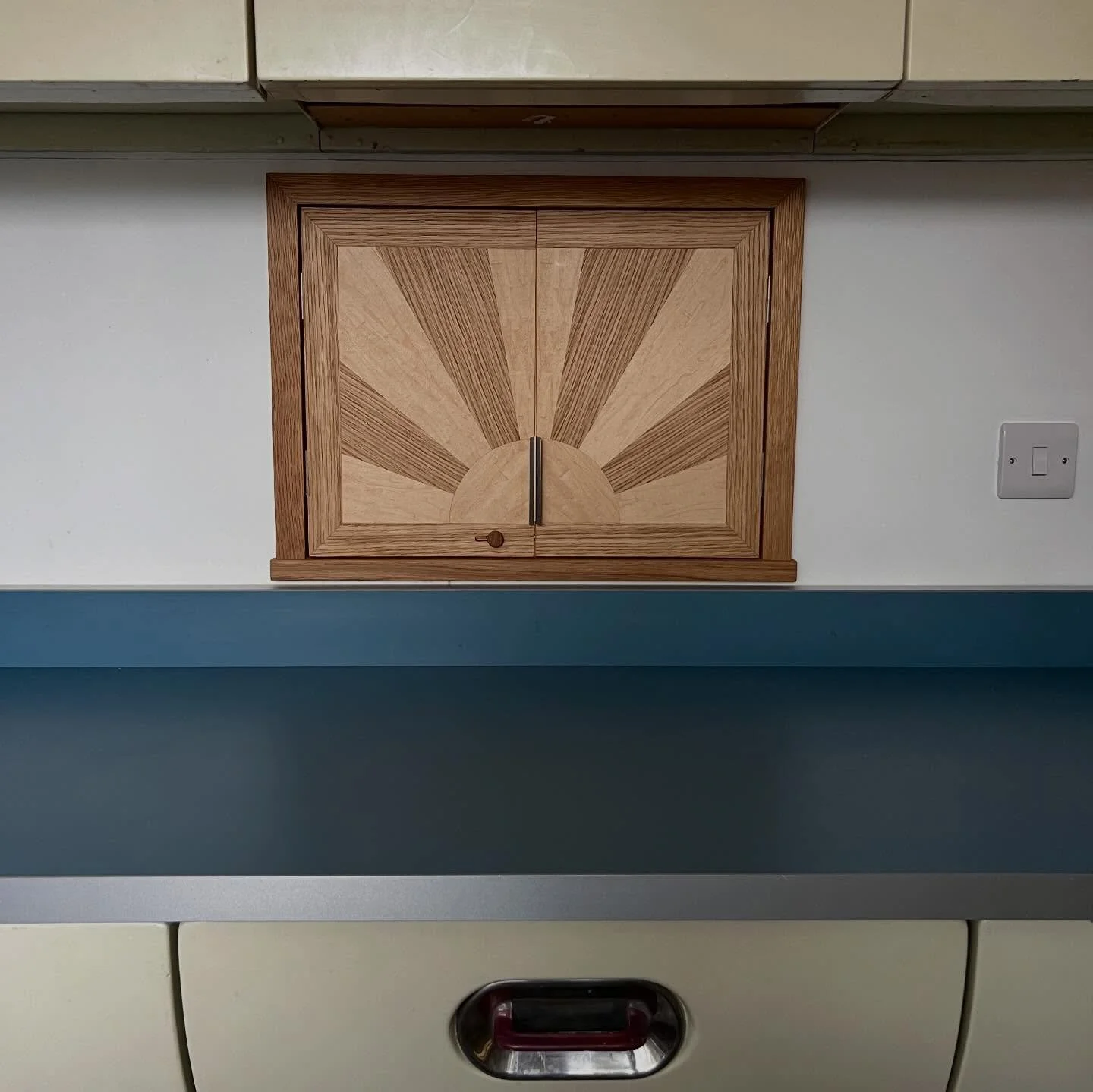 Another pre-Christmas delivery done! A little kitchen hatch this time with a design to match a sunburst pattern on the back door. 

This oak and maple design works really well to gently highlight the design, and then brushed aluminium hardware to mat