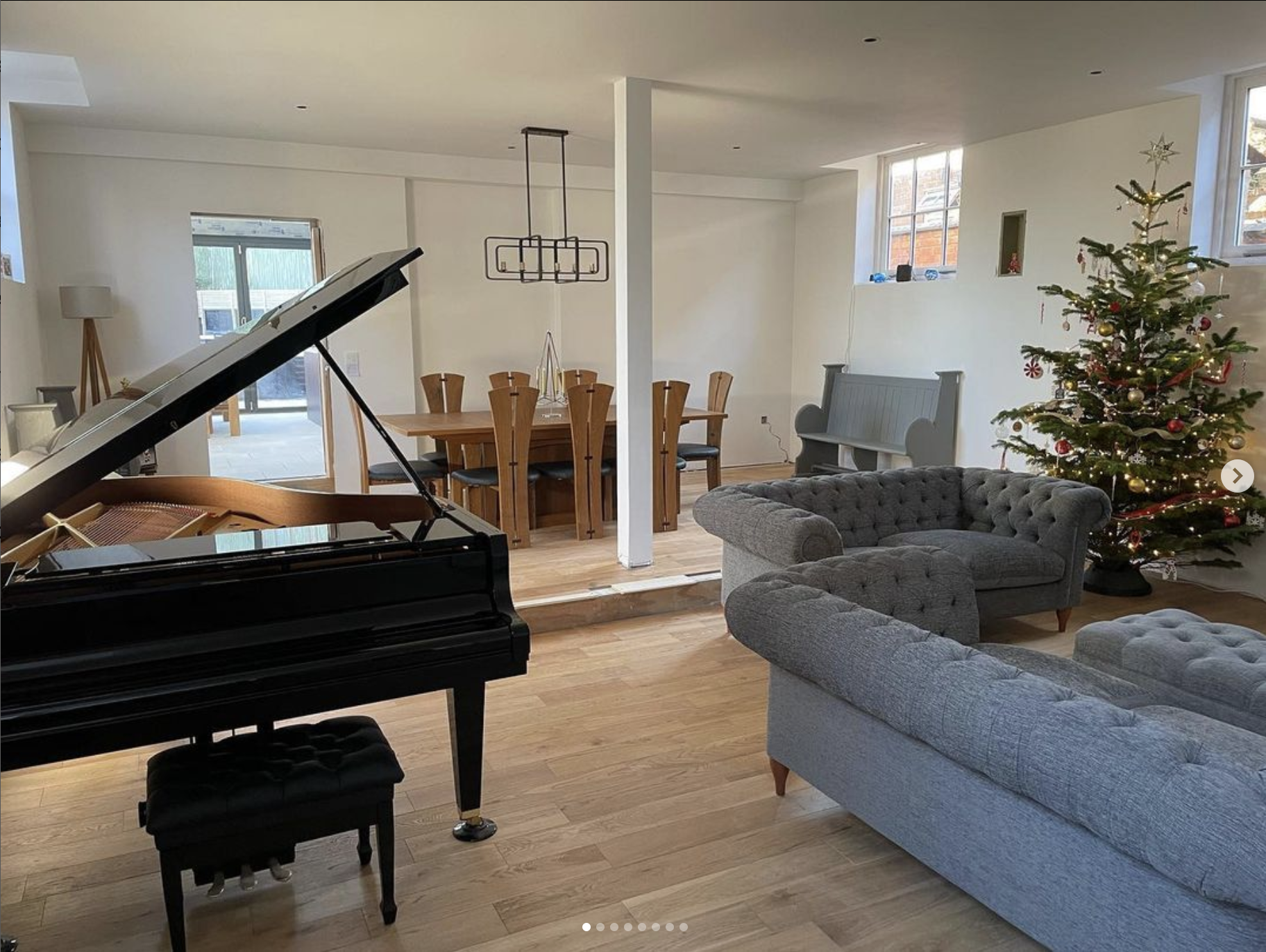 leon 8 - 24 seater pedestal dining table in fumed oak