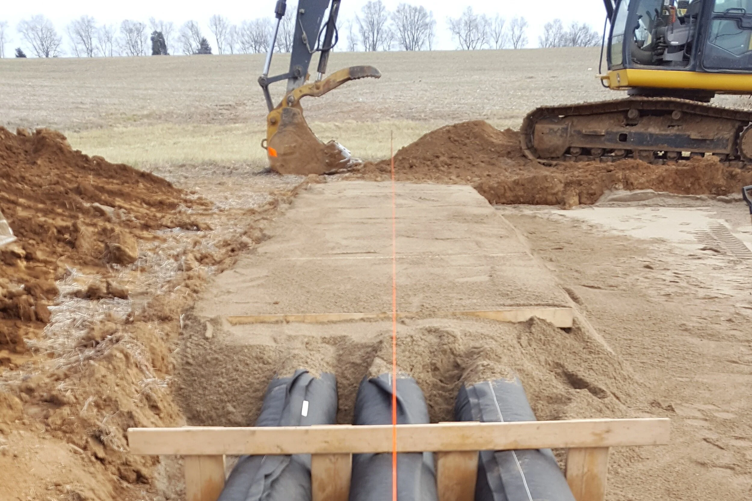 Install of a sand-mound septic system