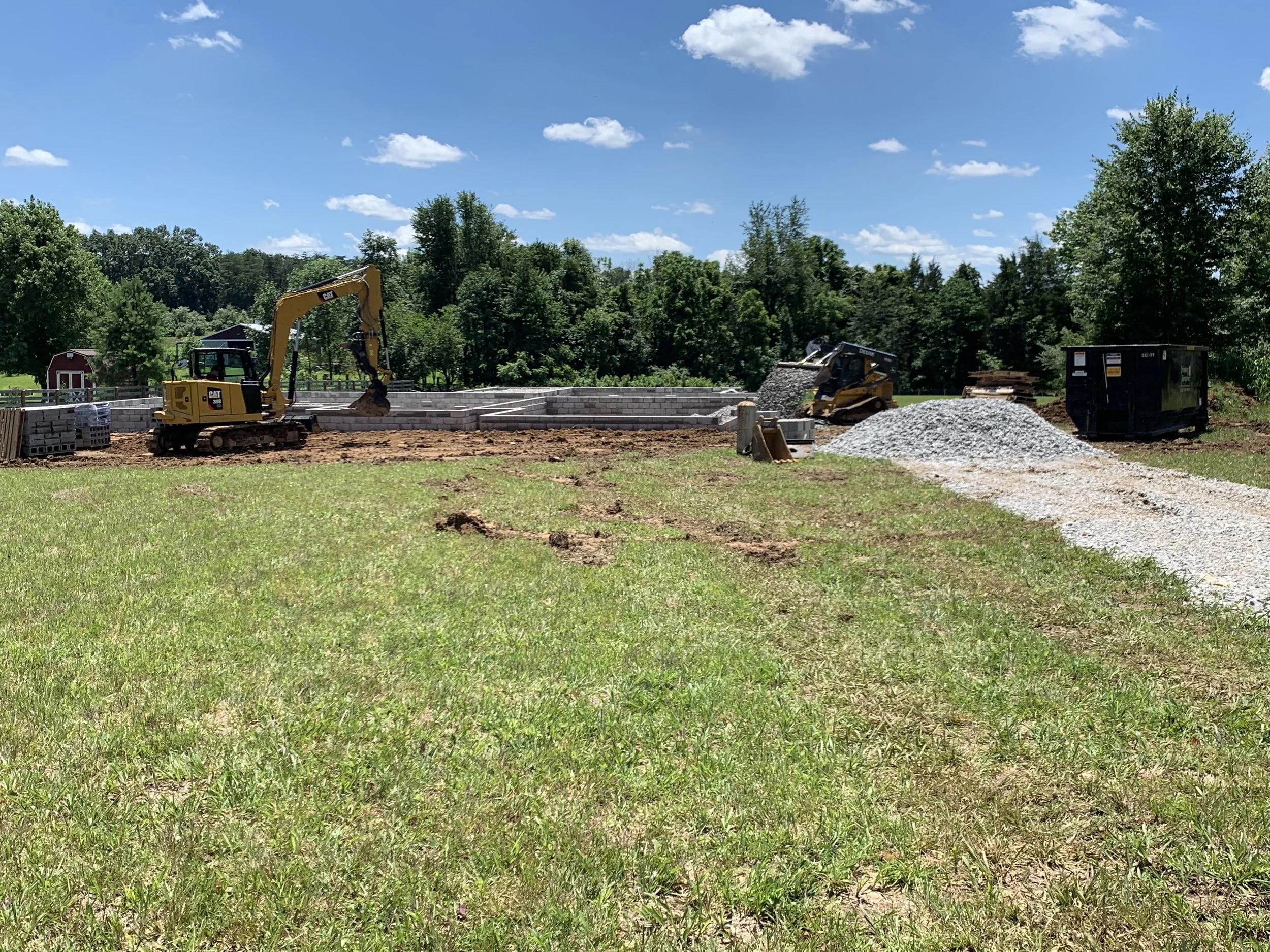 Our crew backfilling a crawlspace foundation