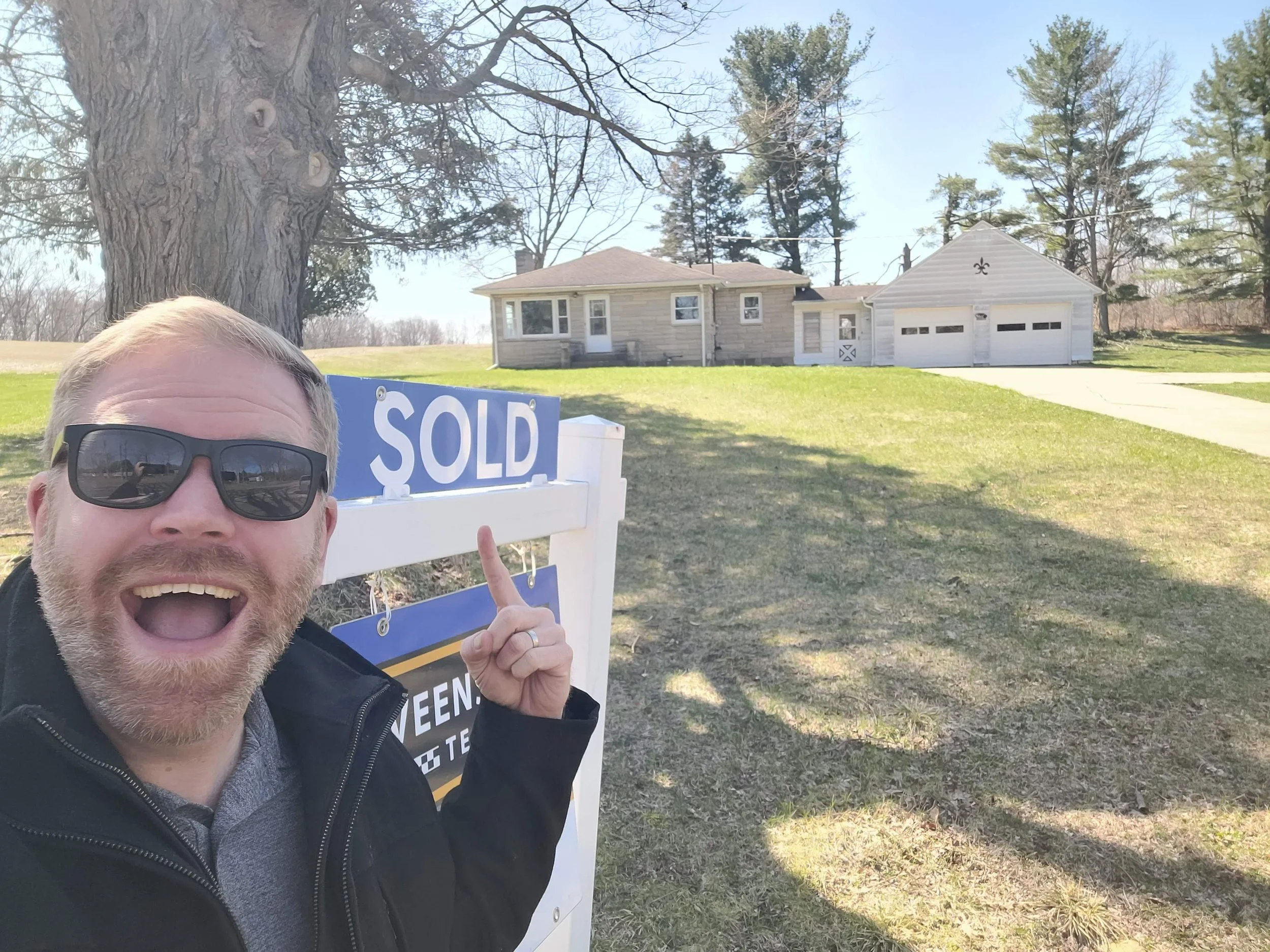 Jason Veenstra in front of sold home at 23160 M-78 Battle Creek Michigan Veenstra Team real estate.