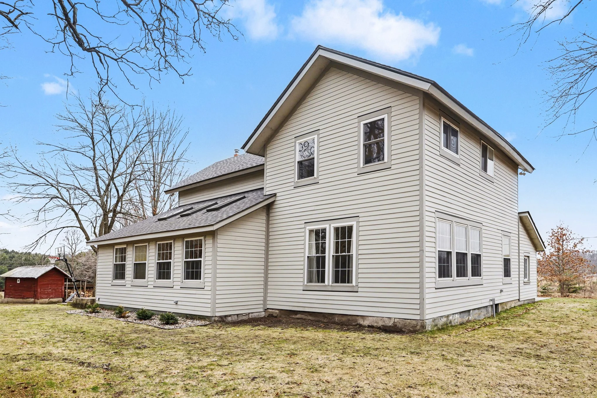 The side view of 10850 W J which shows the additions that have been added over the years.