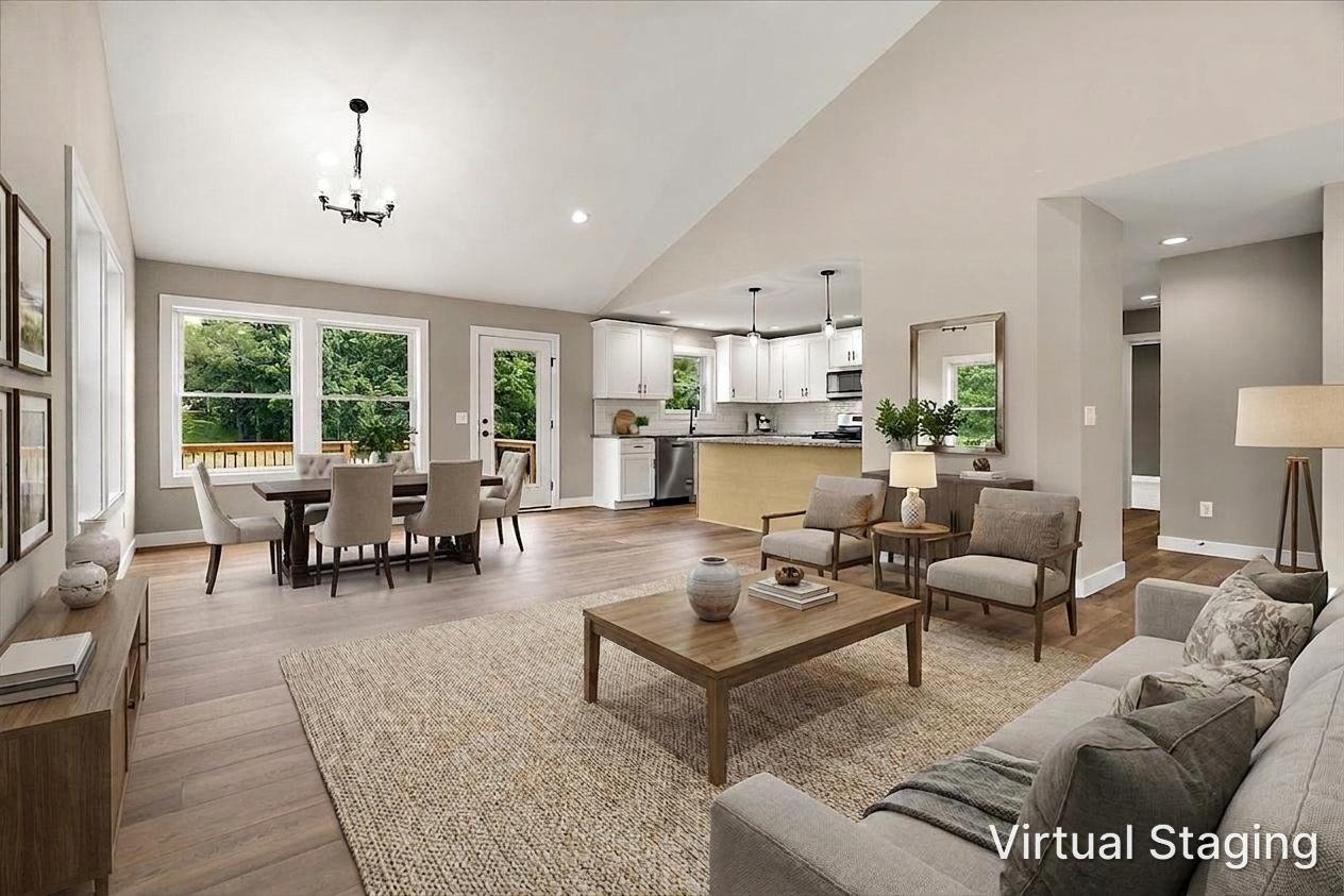Virtually staged living room and kitchen at 237 Markus Glen in Lake Doster