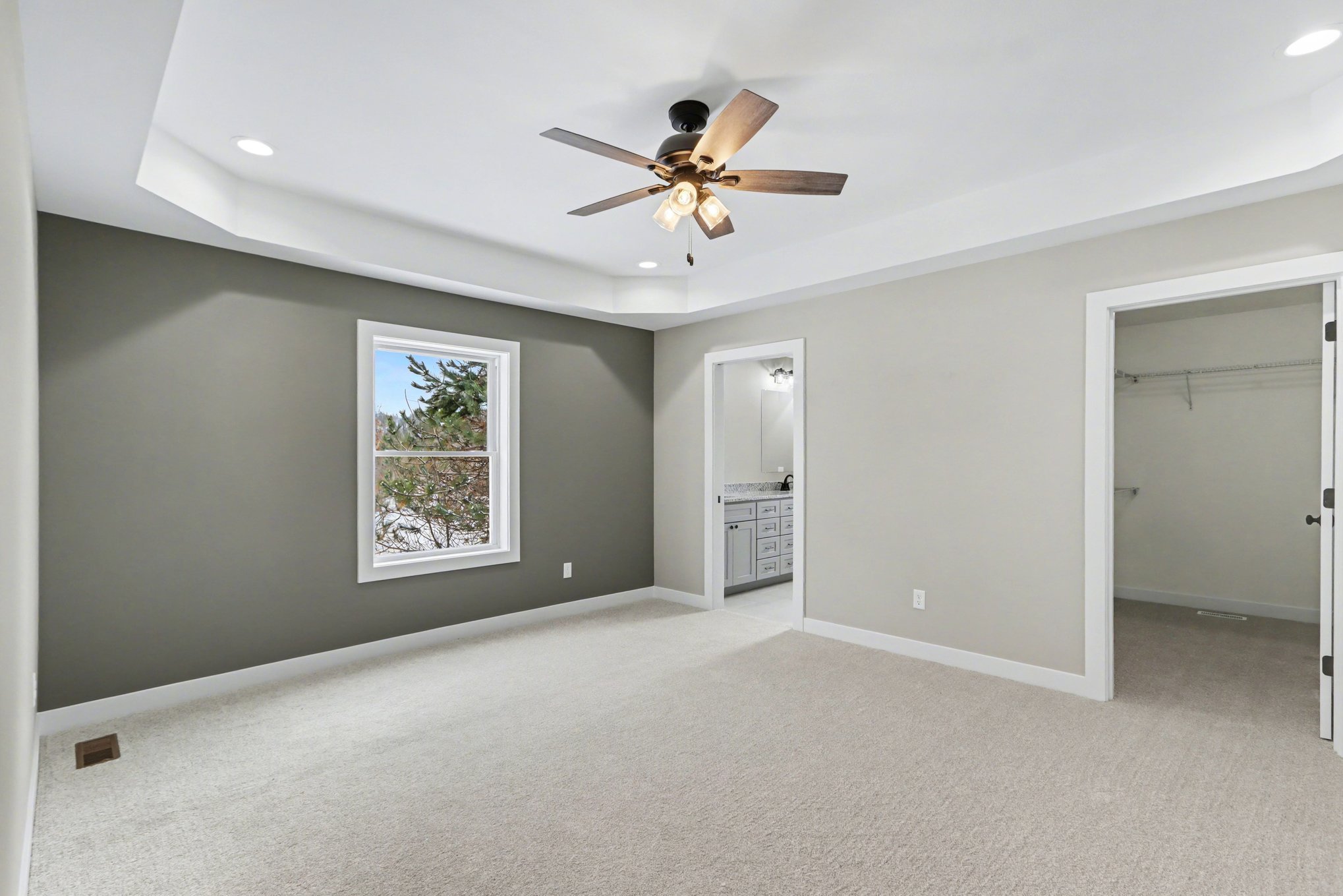 Empty new construction primary suite at 8683 Camomile Drive, Augusta, MI 49012