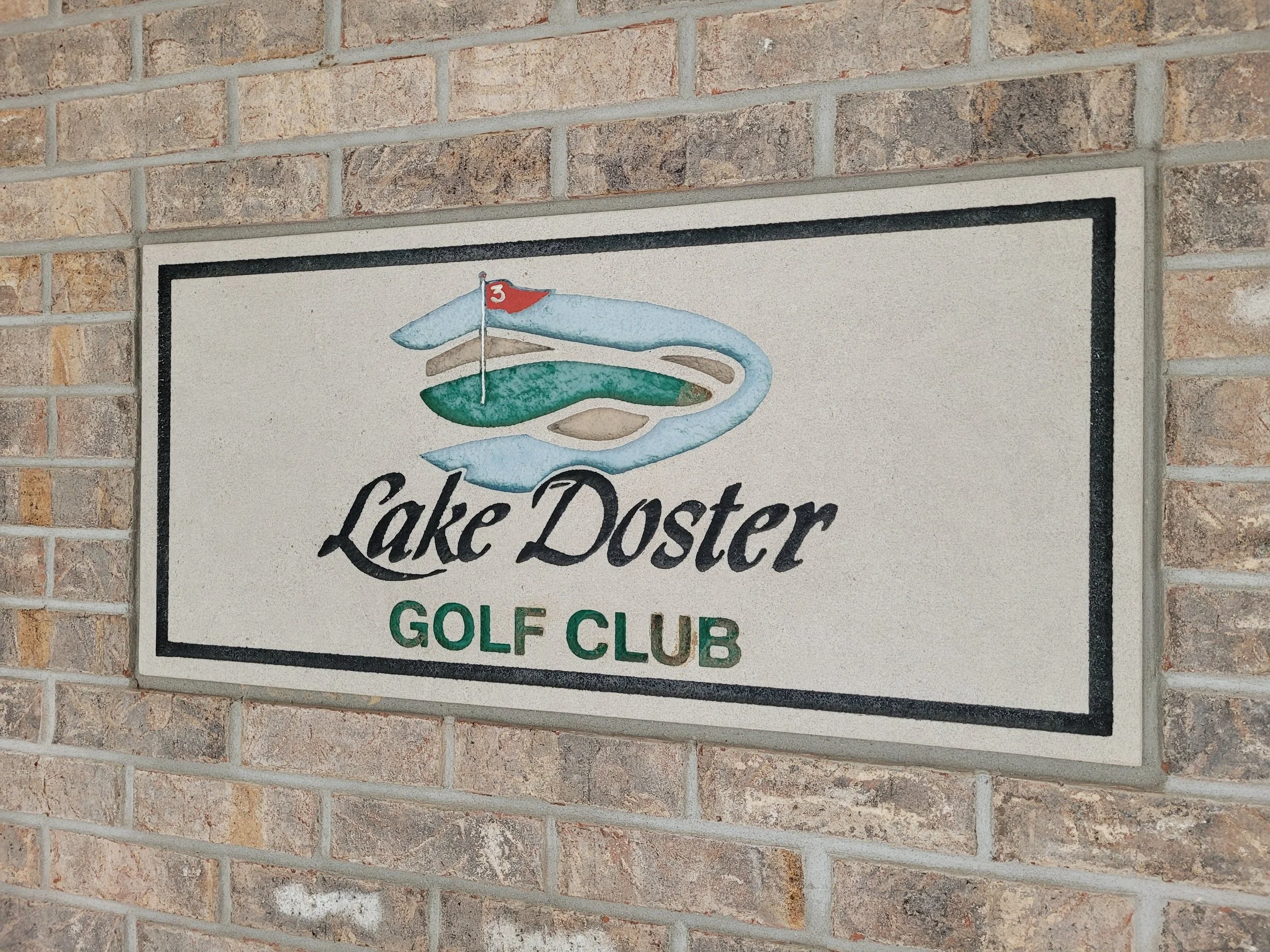 A welcoming sign at the well know Lake Doster Golf Club