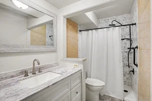 How Does the Walk-In Shower Support Easy Condo Living at 742 W Kilgore Road #108?