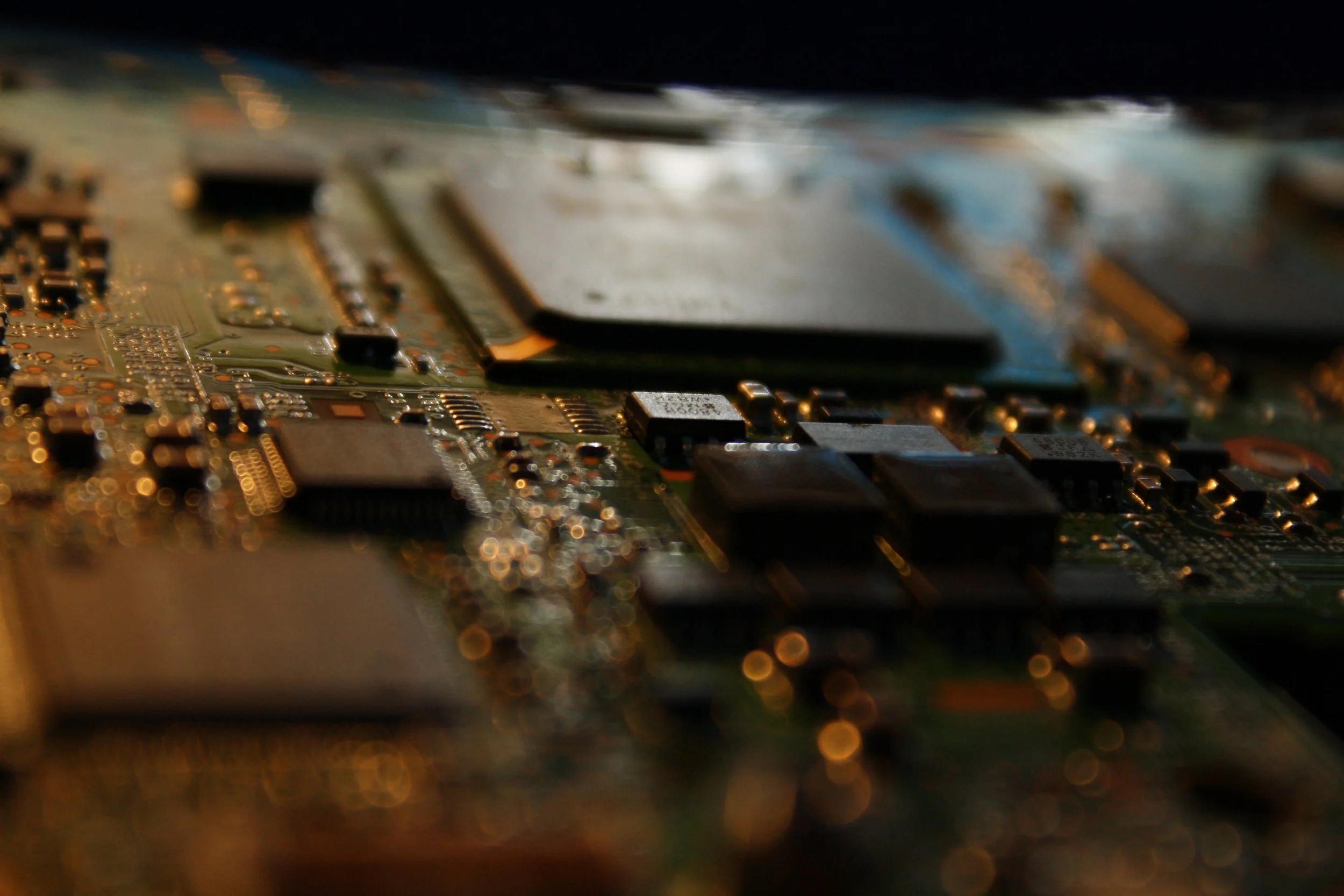 An image of a semiconductor on a motherboard. Credit rawpixel.com