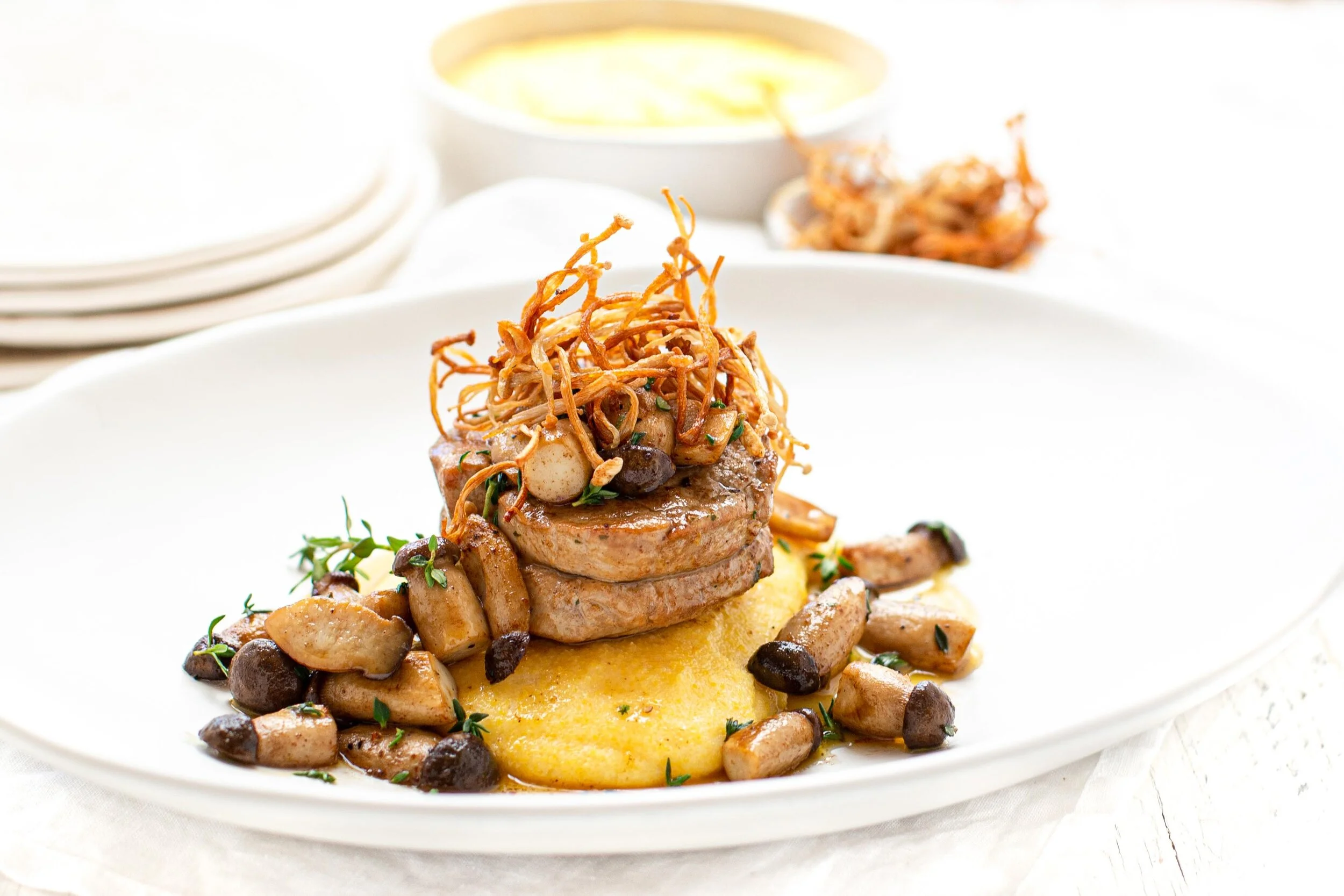 Grilled Pork Fillet Steaks with Polenta, Garlic Baby King Oyster Mushrooms &amp; Crispy Enokis