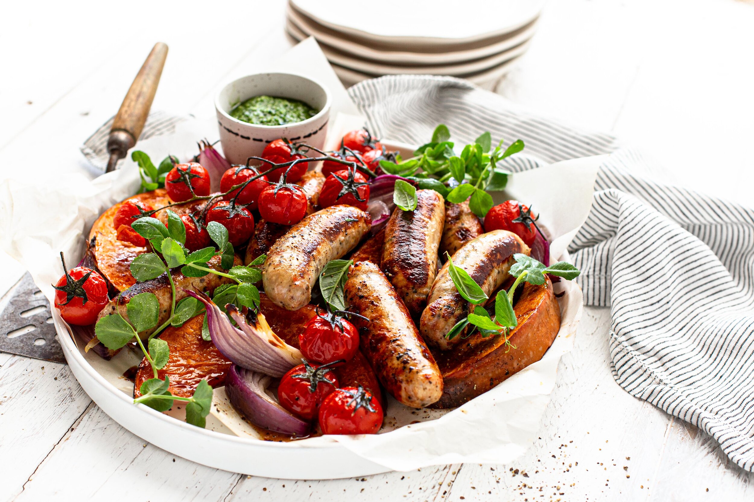 Chicken, Sun-dried Tomato &amp; Basil Sausage Tray Bake with Pesto