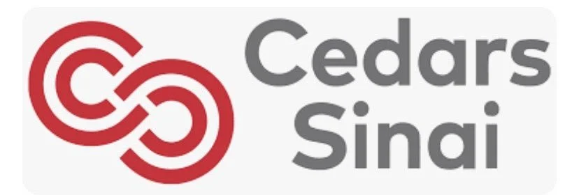 Cedars-Sinai logo with stylized red double-C design on a white background.