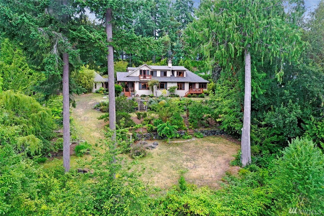  exterior of multi-level house in woods 