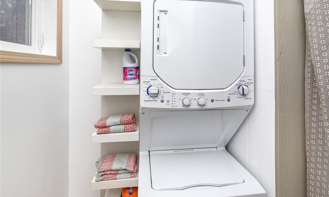  interior of storage area with washer and dryer 