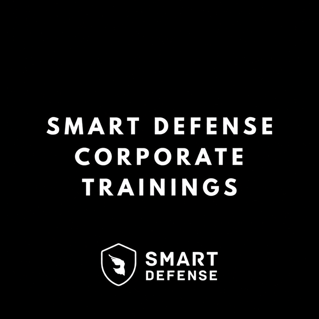 Black background with white text that reads 'Smart Defense Corporate Trainings' and a logo of a shield with a wing inside, followed by the words 'Smart Defense'.