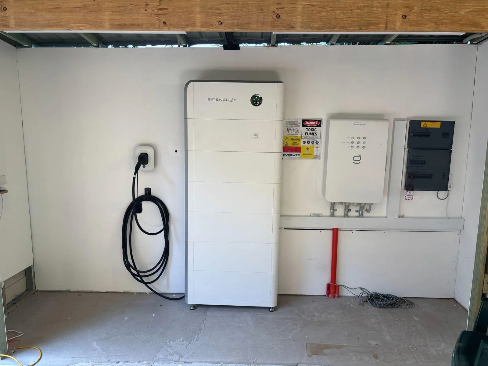 evolved-solar-mudgeeraba-sigenergy-battery-ev-charger-garage.jpg
