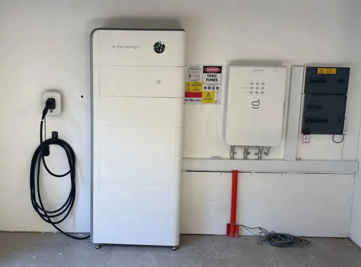 Sigenergy 40 kWh battery, EV charger and gateway installed in a Mudgeeraba garage by Evolved Solar