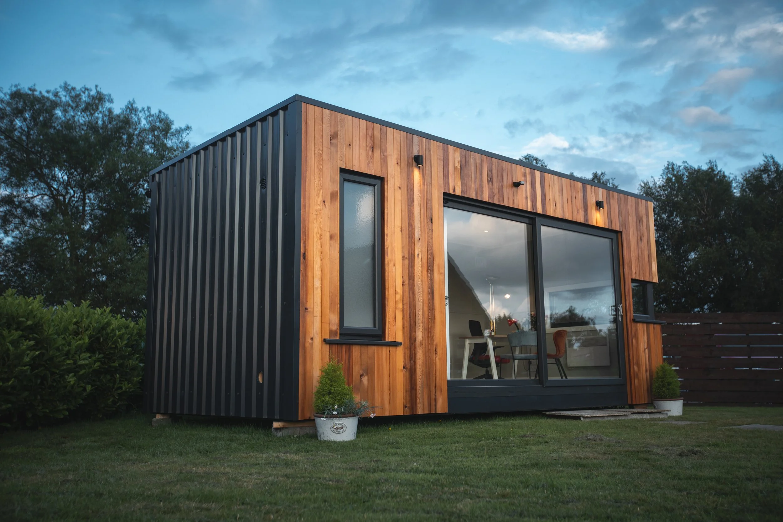 Wooden Clad Extension Pod Placed in Garden