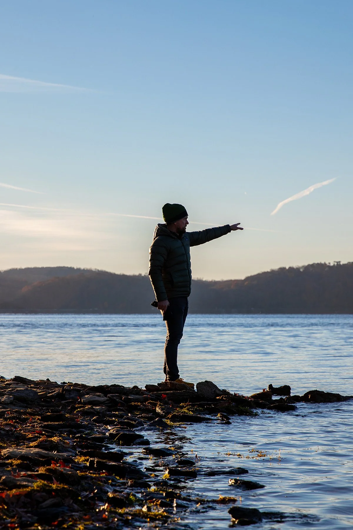 Leif Ramsey scouting along the shoreline of Harrison Bay in east Tennessee.