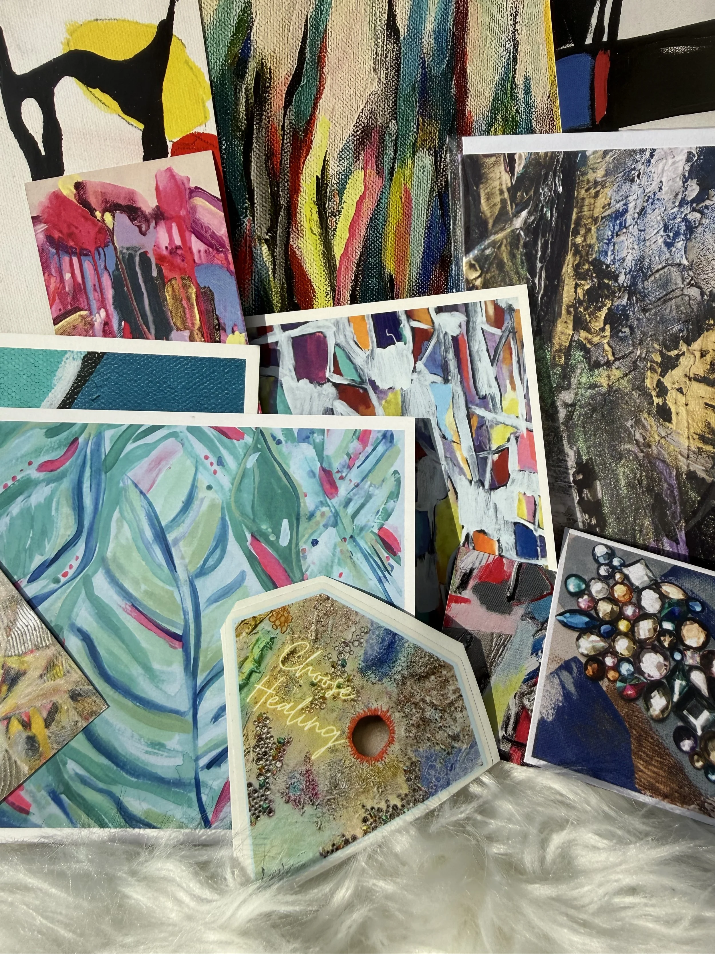 another sample of contents found inside variety pack-sample of contents found inside variety pack-Three 5x7 Postcards, Three 4x6 postcards, Two 2.5” cards, 1 bookmark, 1 blank notecard (4.25 x 5.5), 1 durable vinyl sticker