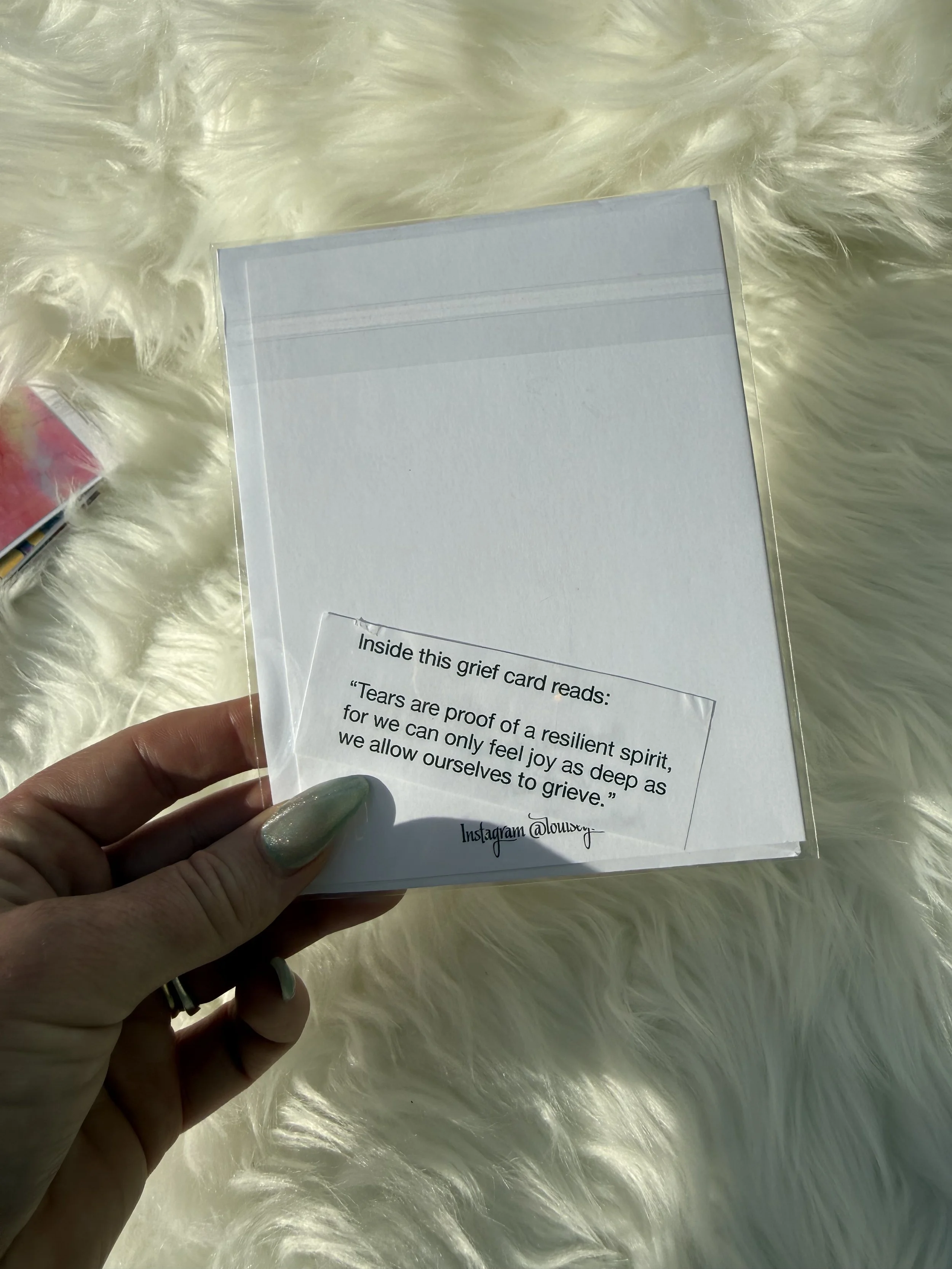 back side with writing inside visible