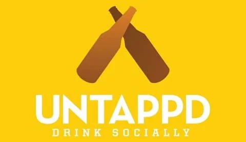 Two crossed beer bottles with the text "UNTAPPED" and the slogan "Drink Socially" on a yellow background.