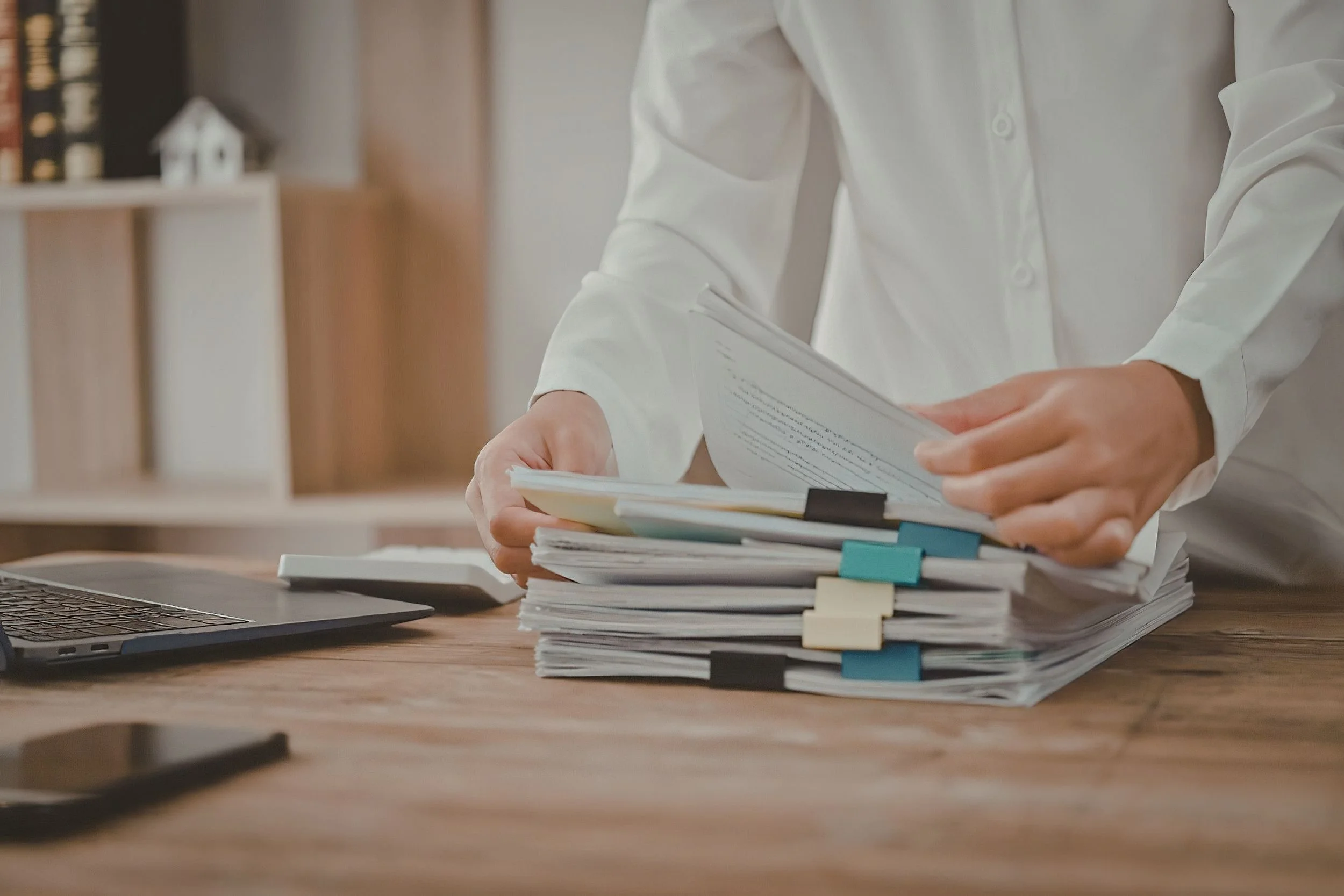Legal documents on a desk during review in a real estate dispute.