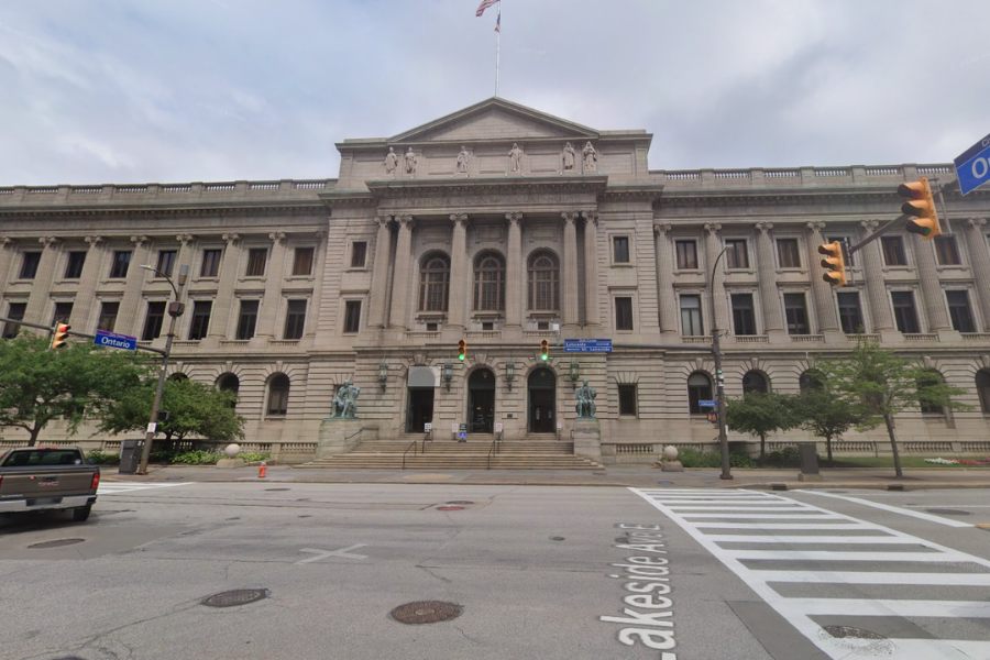 Historic Cuyahoga County Courthouse in downtown Cleveland, featuring a stone exterior, large columns, and the main entrance facing Lakeside Avenue.
