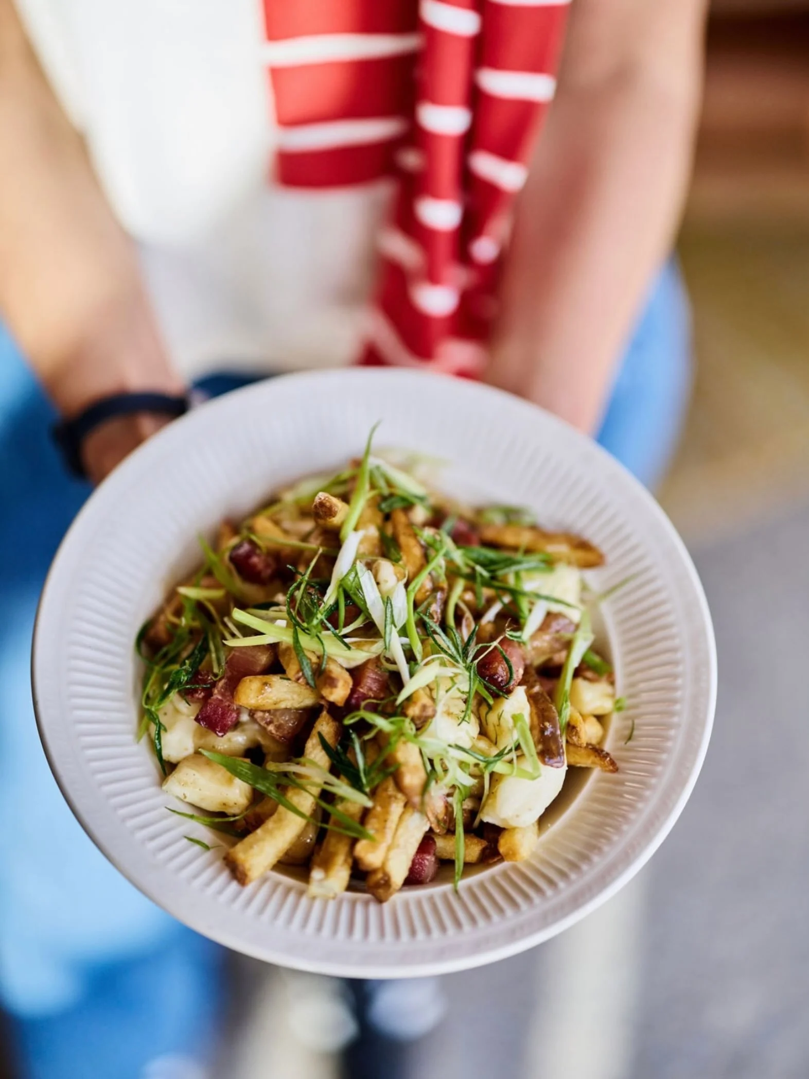 It&rsquo;s always better with @bostromfarms bacon &amp; scallions #poutine
