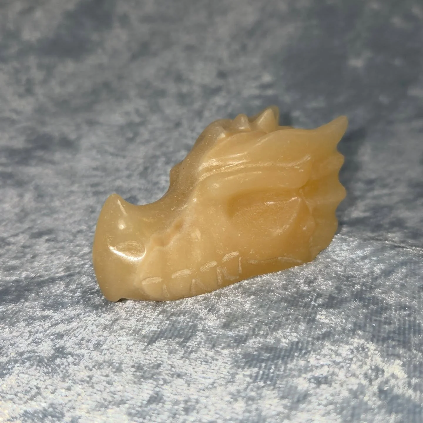 🍊𝐎𝐑𝐀𝐍𝐆𝐄 𝐂𝐀𝐋𝐂𝐈𝐓𝐄 𝐃𝐑𝐀𝐆𝐎𝐍🍊--$4️⃣0️⃣

𝗢𝗿𝗮𝗻𝗴𝗲 𝗖𝗮𝗹𝗰𝗶𝘁𝗲 is a joyful stone that can give one energy and motivation to overcome laziness and emotional stress. 😁 It can cleanse one's energy and help one to get through heavy t