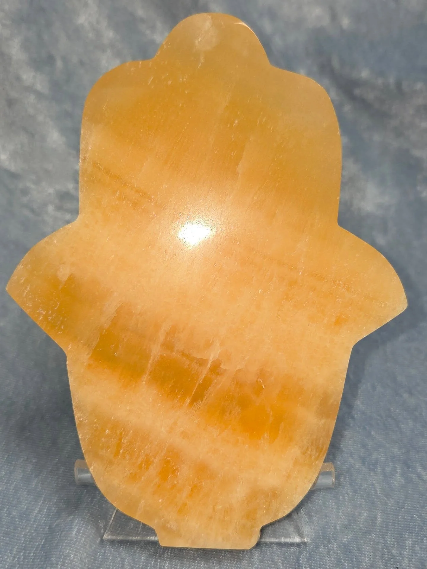 🍊𝐎𝐑𝐀𝐍𝐆𝐄 𝐂𝐀𝐋𝐂𝐈𝐓𝐄 𝐇𝐀𝐌𝐒𝐀 𝐇𝐀𝐍𝐃🍊--$5️⃣0️⃣

𝗢𝗿𝗮𝗻𝗴𝗲 𝗖𝗮𝗹𝗰𝗶𝘁𝗲 is a joyful stone that can give one energy and motivation to overcome laziness and emotional stress. 😁 It can cleanse one's energy and help one to get through 