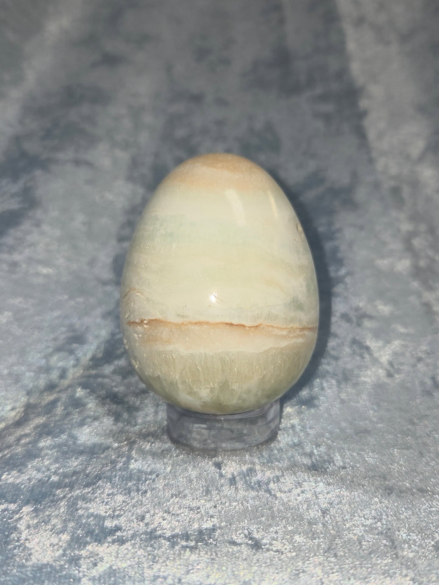 🩵🏖𝐂𝐀𝐑𝐈𝐁𝐁𝐄𝐀𝐍 𝐁𝐋𝐔𝐄 𝐄𝐆𝐆🏖🩵--$4️⃣5️⃣

𝗖𝗮𝗿𝗶𝗯𝗯𝗲𝗮𝗻 𝗕𝗹𝘂𝗲 𝗖𝗮𝗹𝗰𝗶𝘁𝗲 is an emotionally soothing stone that facilitates the release of stress, drama and anger which can help one reach deeper levels of meditation. 😌 It promo