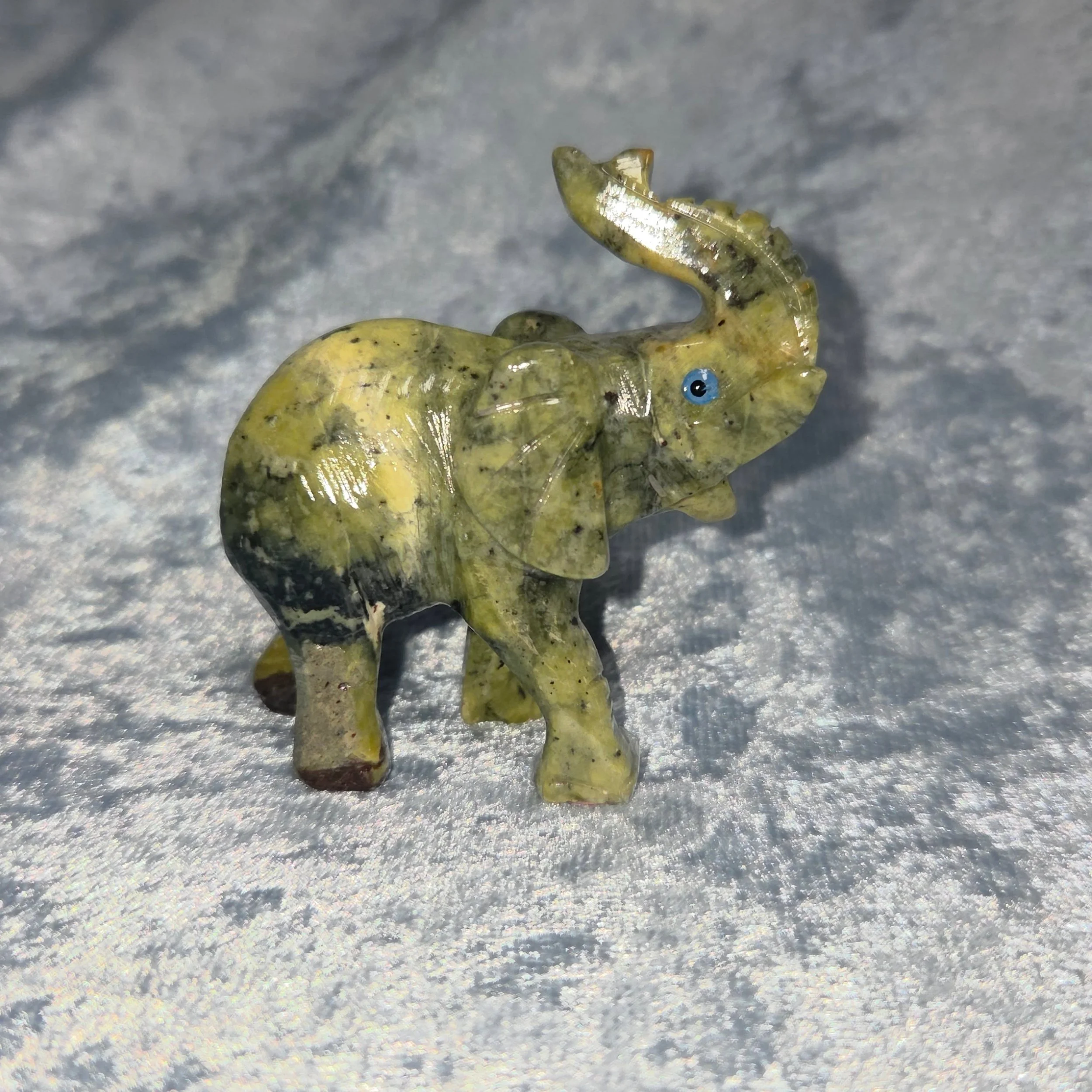 🐍𝐒𝐄𝐑𝐏𝐄𝐍𝐓𝐈𝐍𝐄 𝐄𝐋𝐄𝐏𝐇𝐀𝐍𝐓🐍--$2️⃣0️⃣
𝗦𝗲𝗿𝗽𝗲𝗻𝘁𝗶𝗻𝗲 is excellent for trance work, rituals, and Shamanistic works. It aids meditation 🧘&zwj;♀️ and balances your emotions and mental thinking.  Serpentine helps you understand the sp