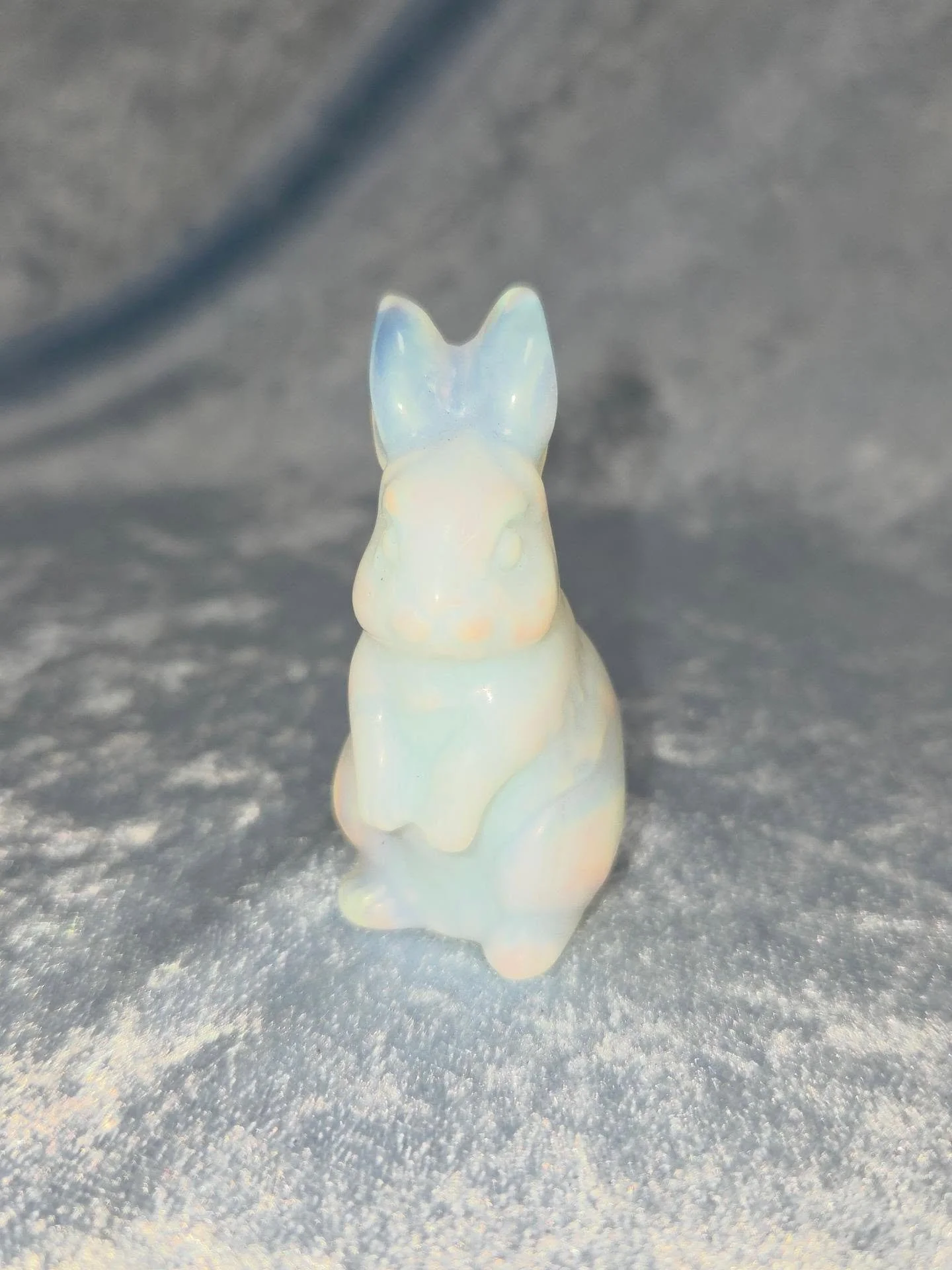 ✨️𝐎𝐏𝐀𝐋𝐈𝐓𝐄 𝐁𝐔𝐍𝐍𝐘 𝐑𝐀𝐁𝐁𝐈𝐓✨️--$2️⃣5️⃣

𝗢𝗽𝗮𝗹𝗶𝘁𝗲 is a man-made opal that can help aid meditation, self exploration, and reflection. 🧘&zwj;♀️ It can help one with depression and anxiety as it has a calming energy that soothes and s