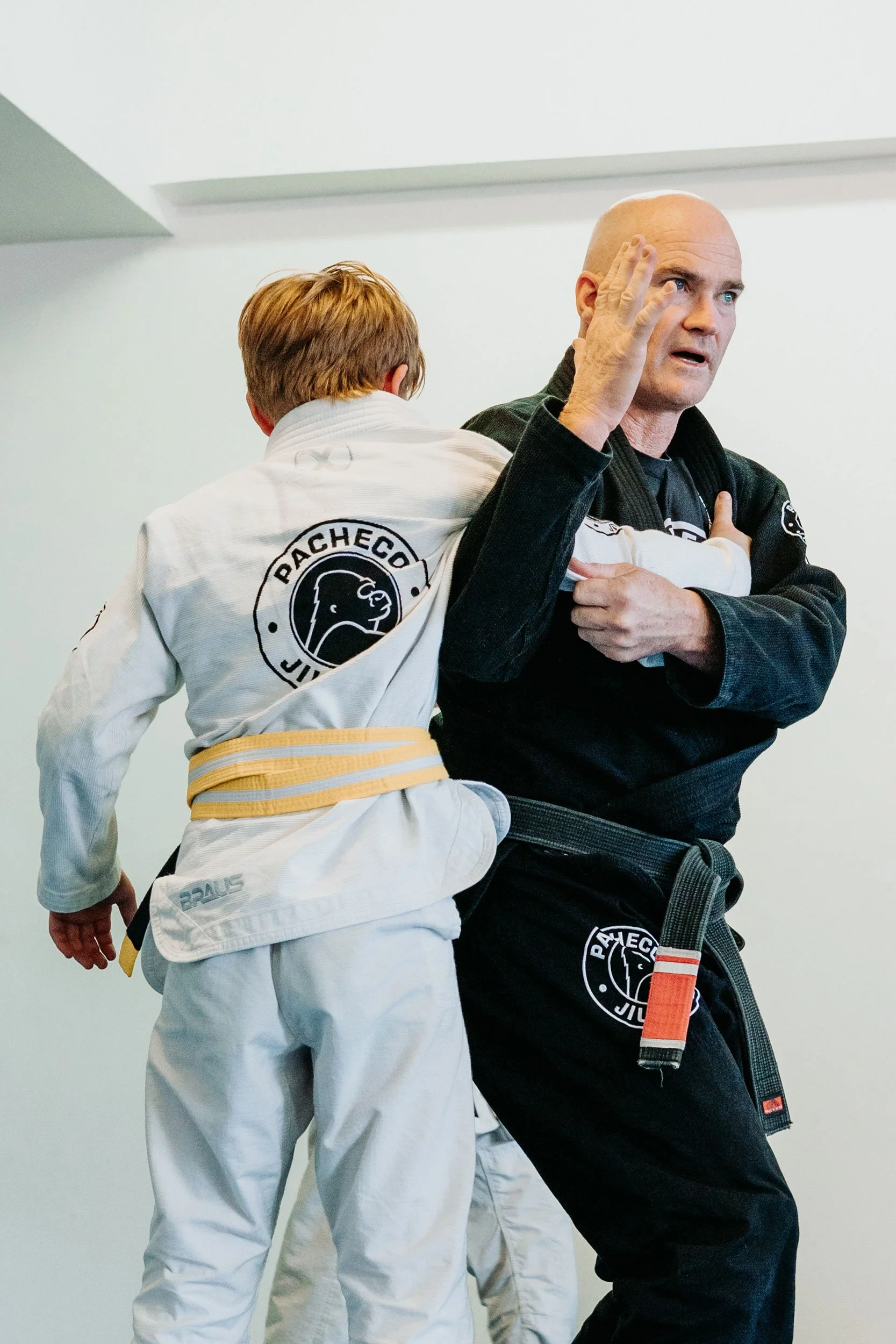 Sensei Zanda Hoffmann teaching junior Brazilian Jiu-Jitsu at Pacheco Jiu-Jitsu Avalon