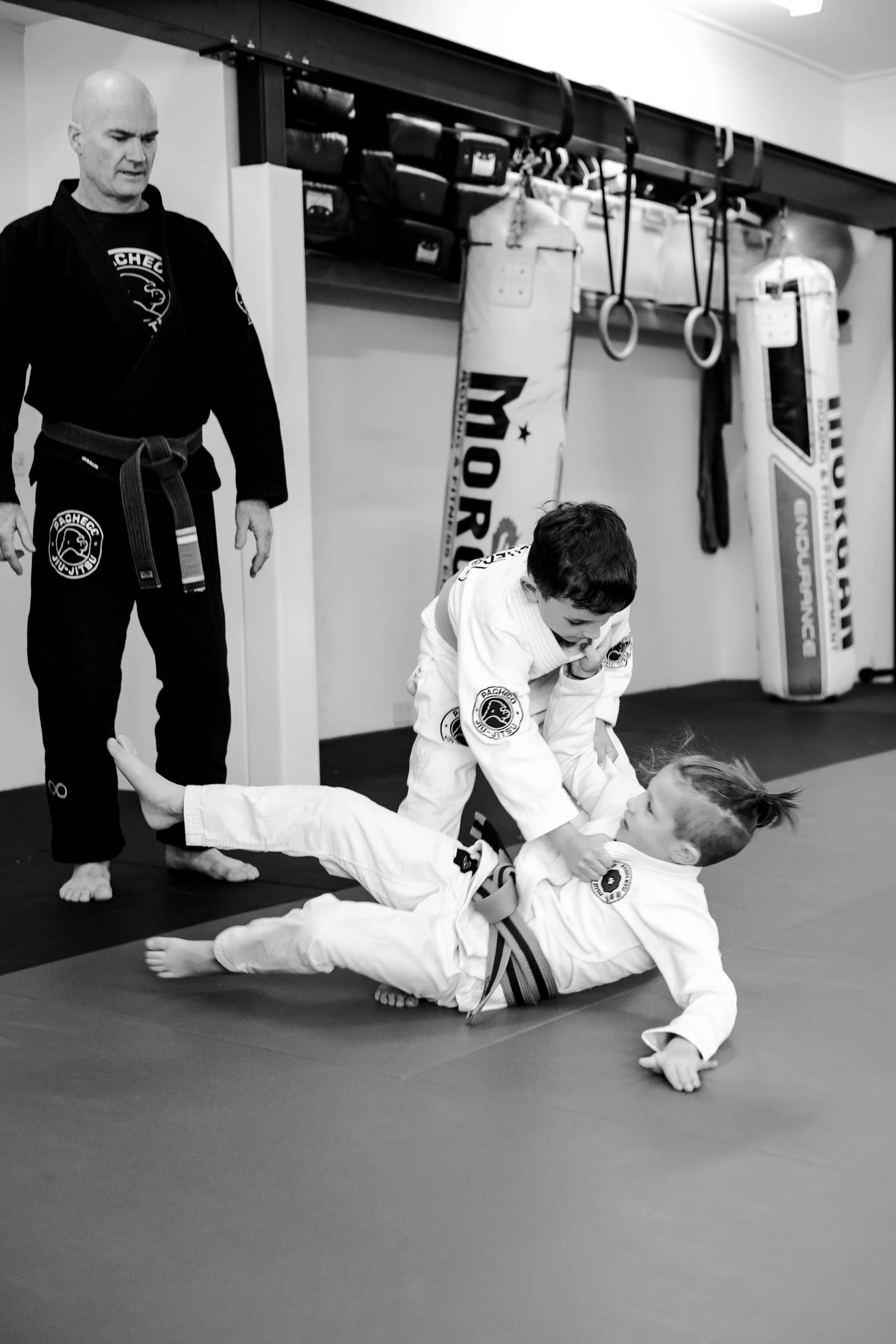 Junior Brazilian Jiu-Jitsu technique practice at Pacheco Jiu-Jitsu Avalon