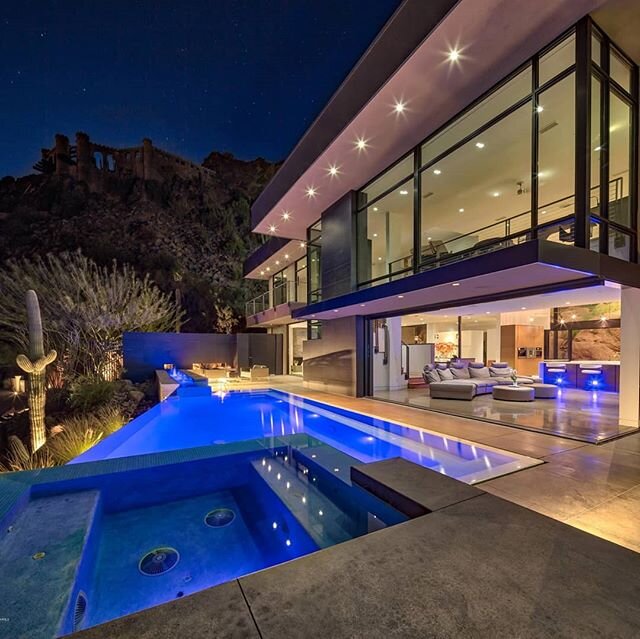 $5,995,000 | Camelback | Phoenix 
A Magnificent Contemporary Glass see -thru Retreat high on Camelback Mountain which looks at fabulous Boulders nestled right outside the glass walls in the back, and panoramic City Light Views flooding the front. Dis