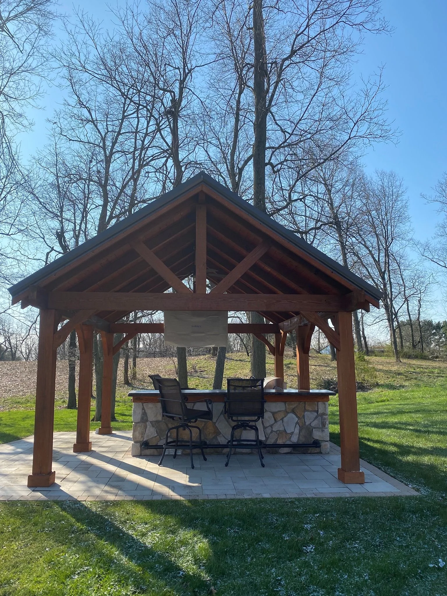 Experience Outdoor Cooking and Cozy Gatherings With an Outdoor Kitchen and Fire Pit in the Green, OH Area