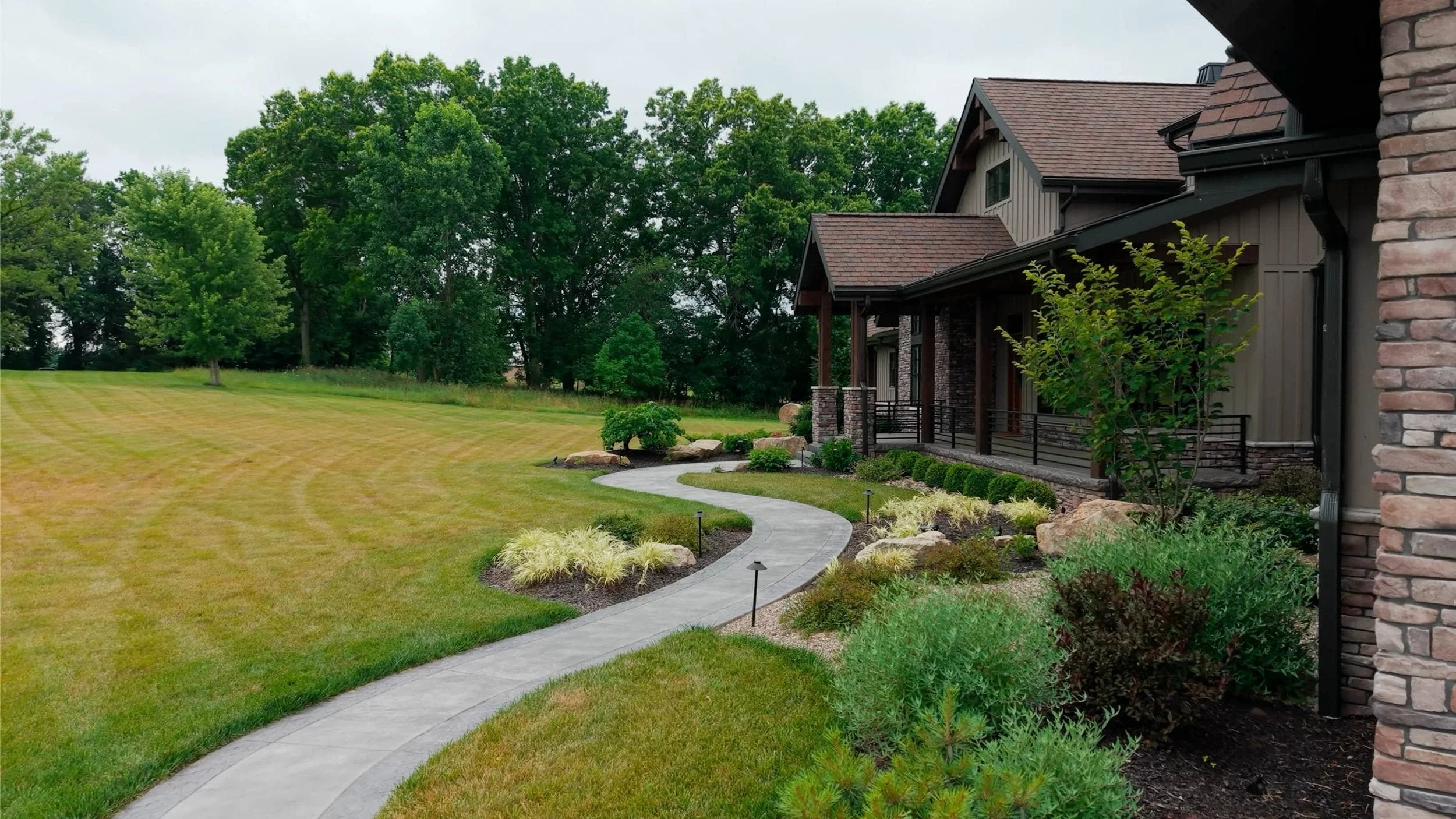 Lush Landscape Plantings Around a Patio Space in Lake Township, OH