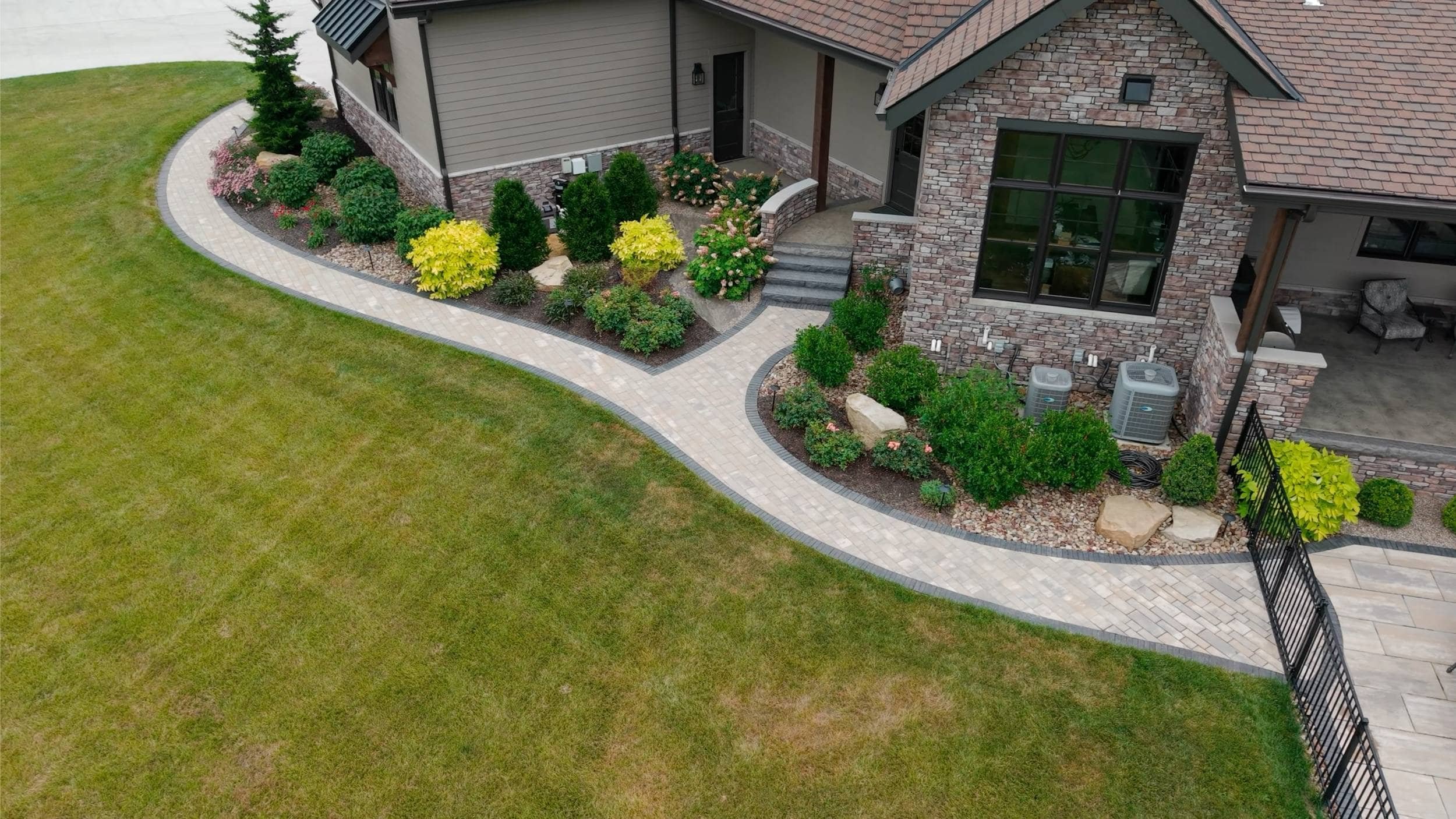 Colorful Flower Bed Plantings for a Welcoming Entryway in UnionTown, OH