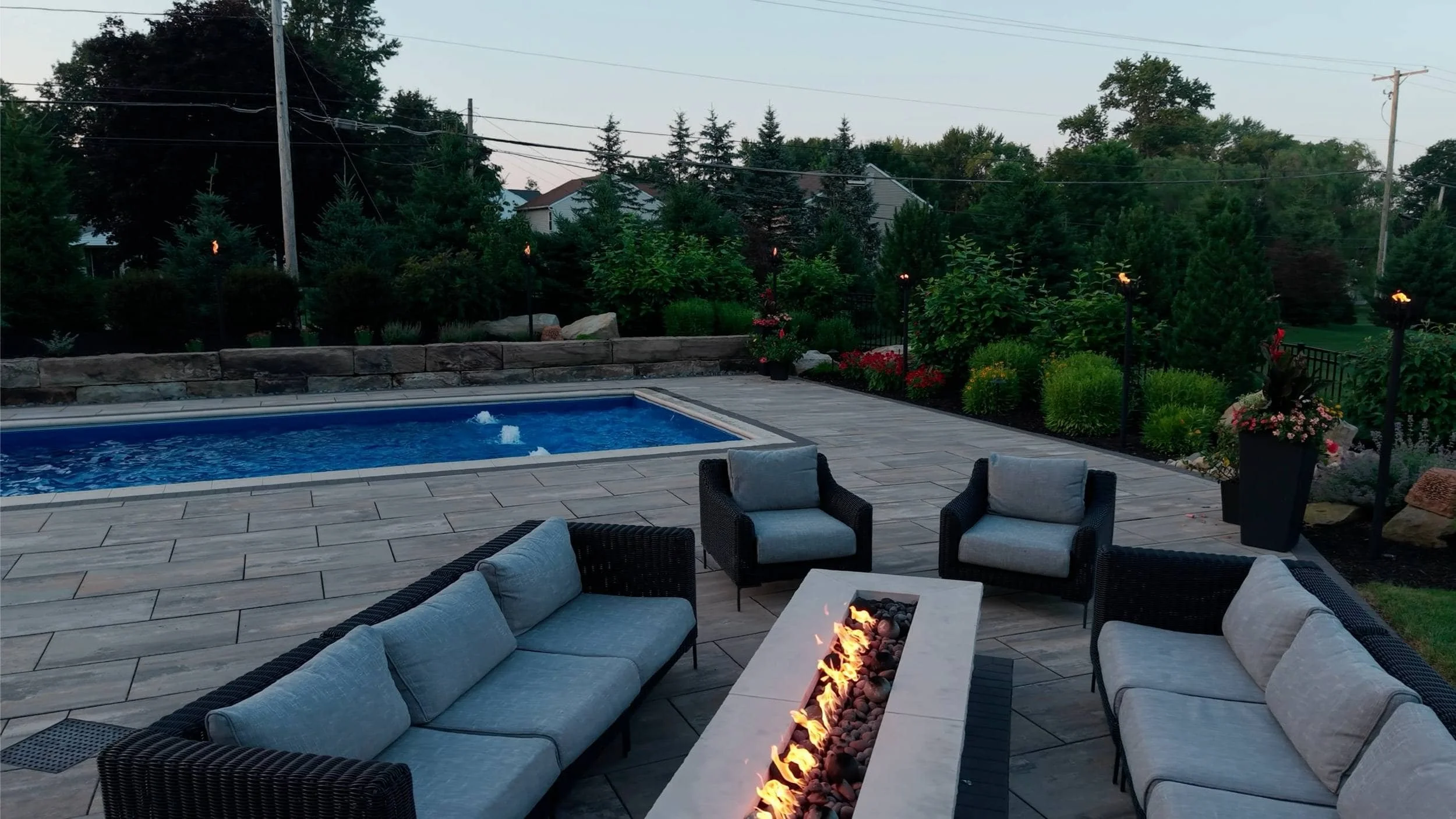 Outdoor Entertainment Space With a Modern Fire Pit in Greentown, OH