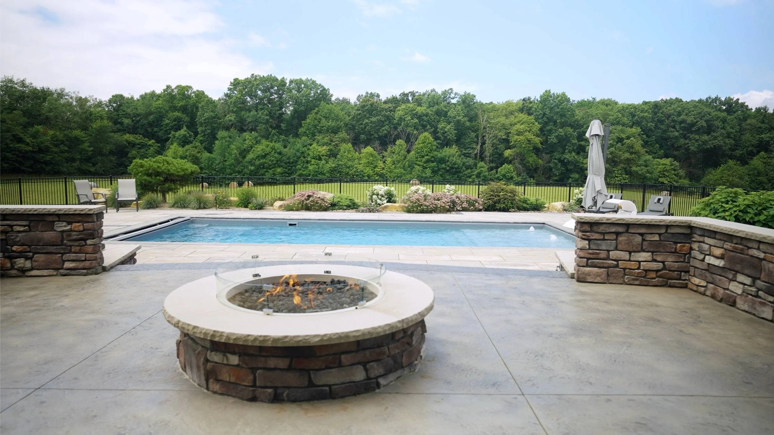 Elegant Patio Layout Featuring a Wood-Burning Fire Pit in Tuscarawas Township, OH