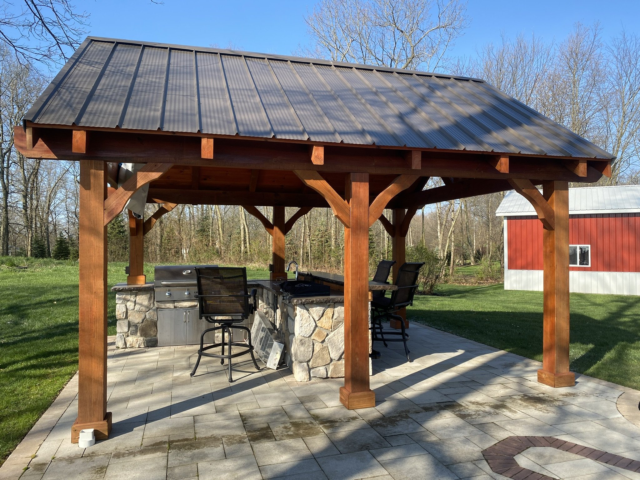 How a Pavilion and Outdoor Kitchen Create a True Backyard Retreat in Lexington Township, OH .jpeg