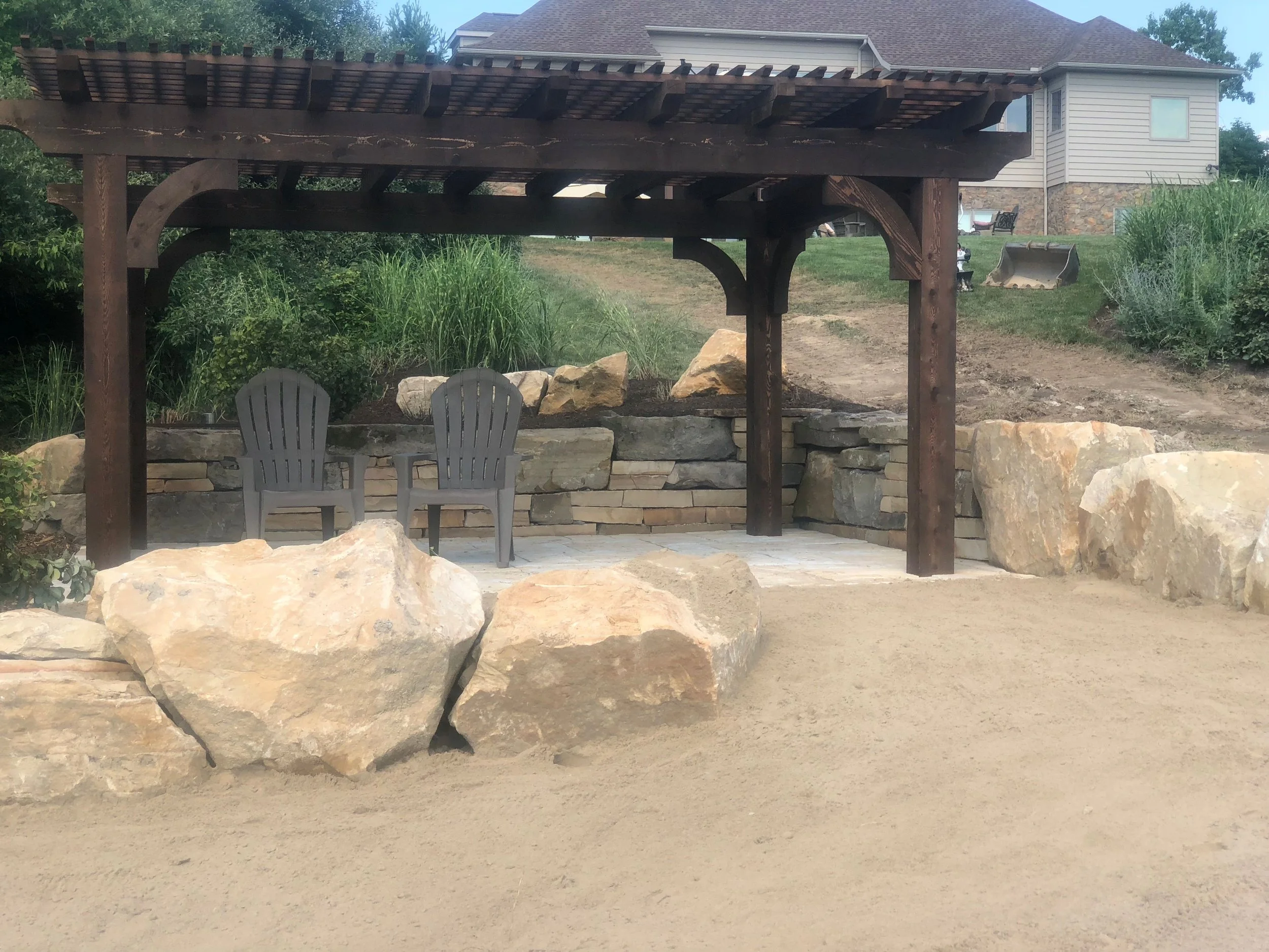 Wooden pergola in New Franklin, OH with outdoor seating area