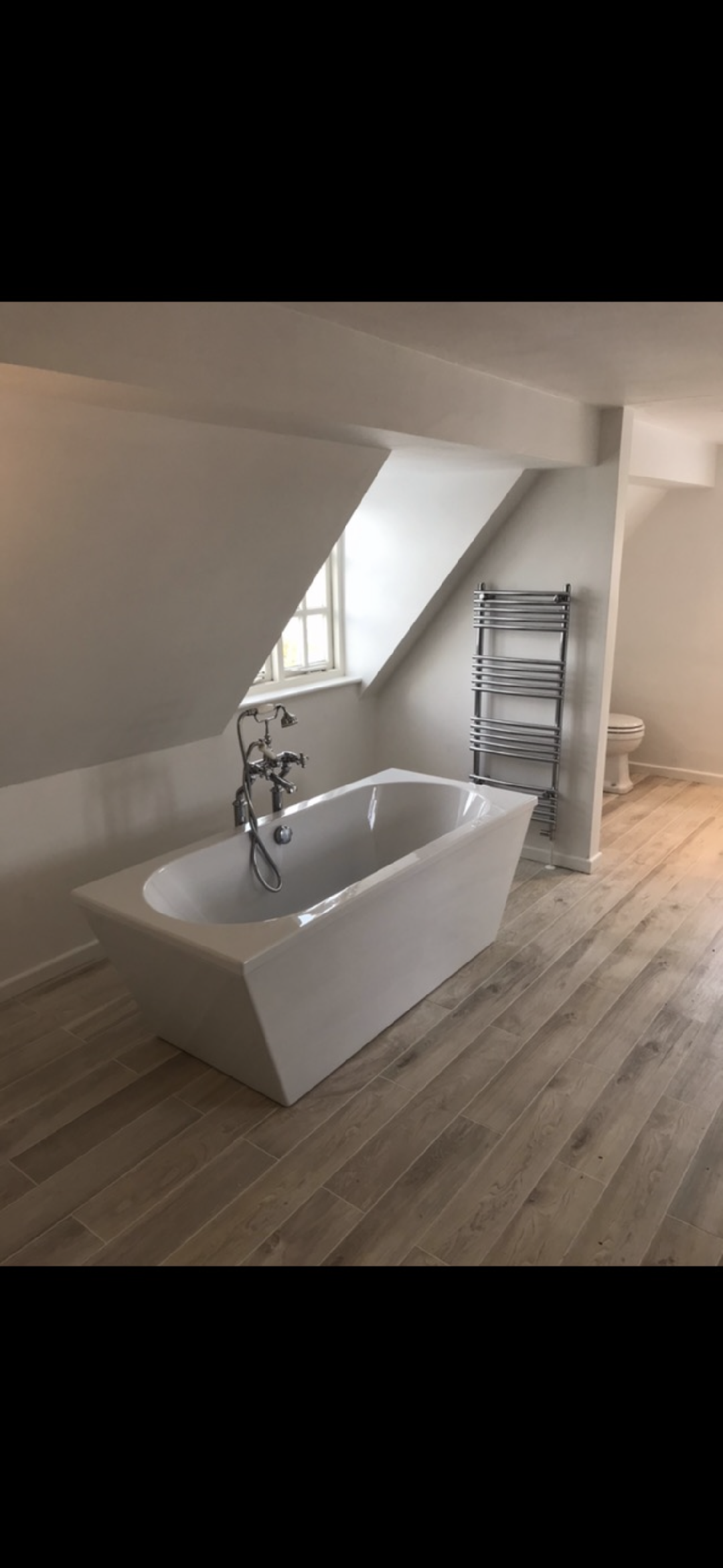 Previous project featuring free standing bath and heated towel rail
