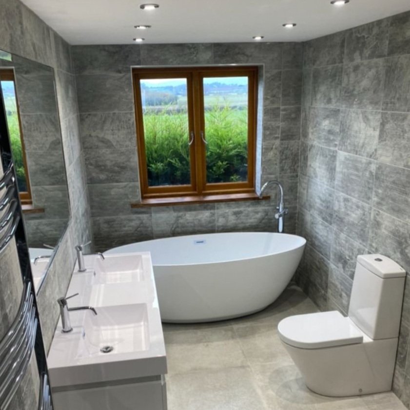 Luxury bathroom installed by Cotswold Vale with free standing bath