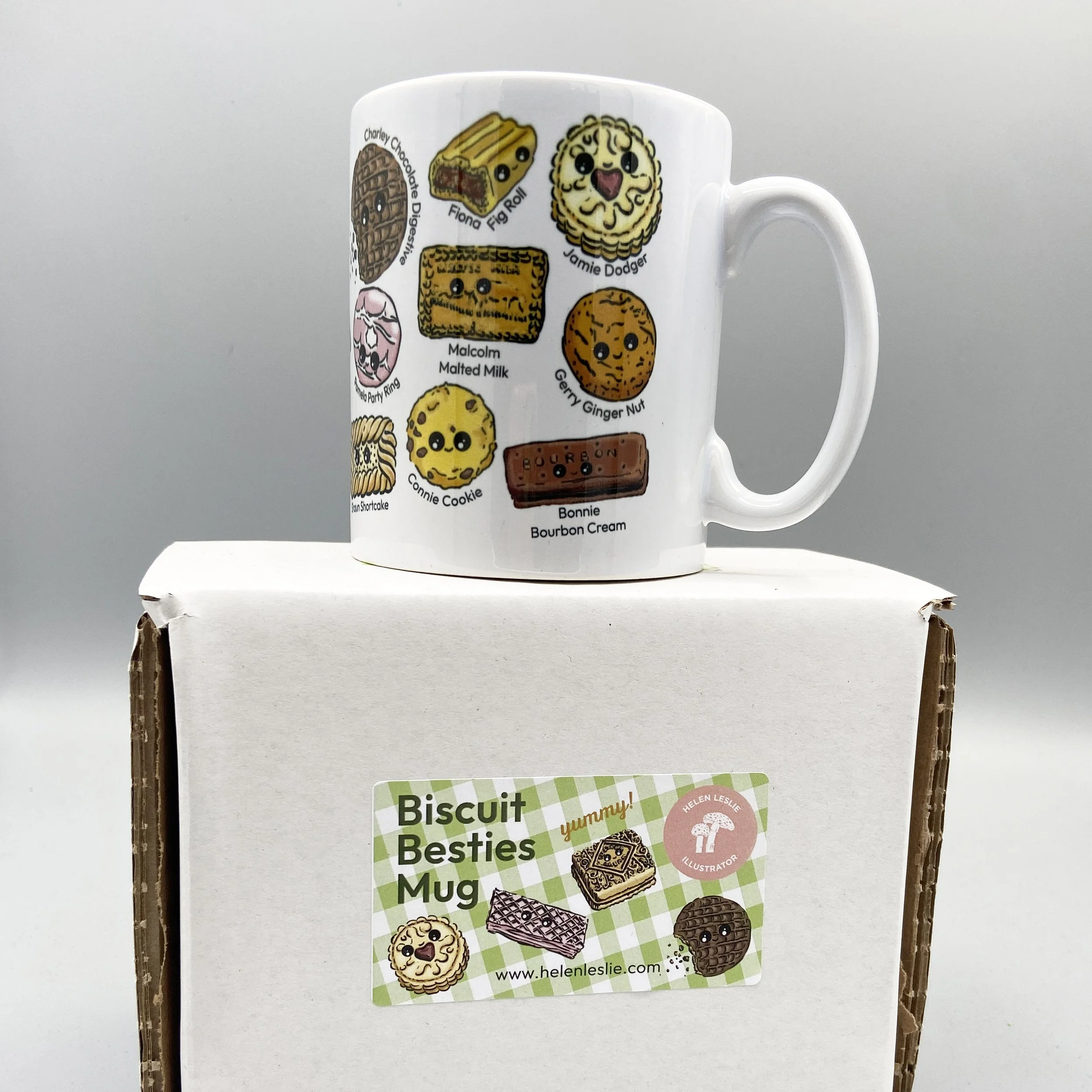 Biscuit Besties mug full of tea dunking favourite biscuits with alliterative names for a splash of humour! Perfect for a nice cup of tea. By Devon artist Helen Leslie Illustrator