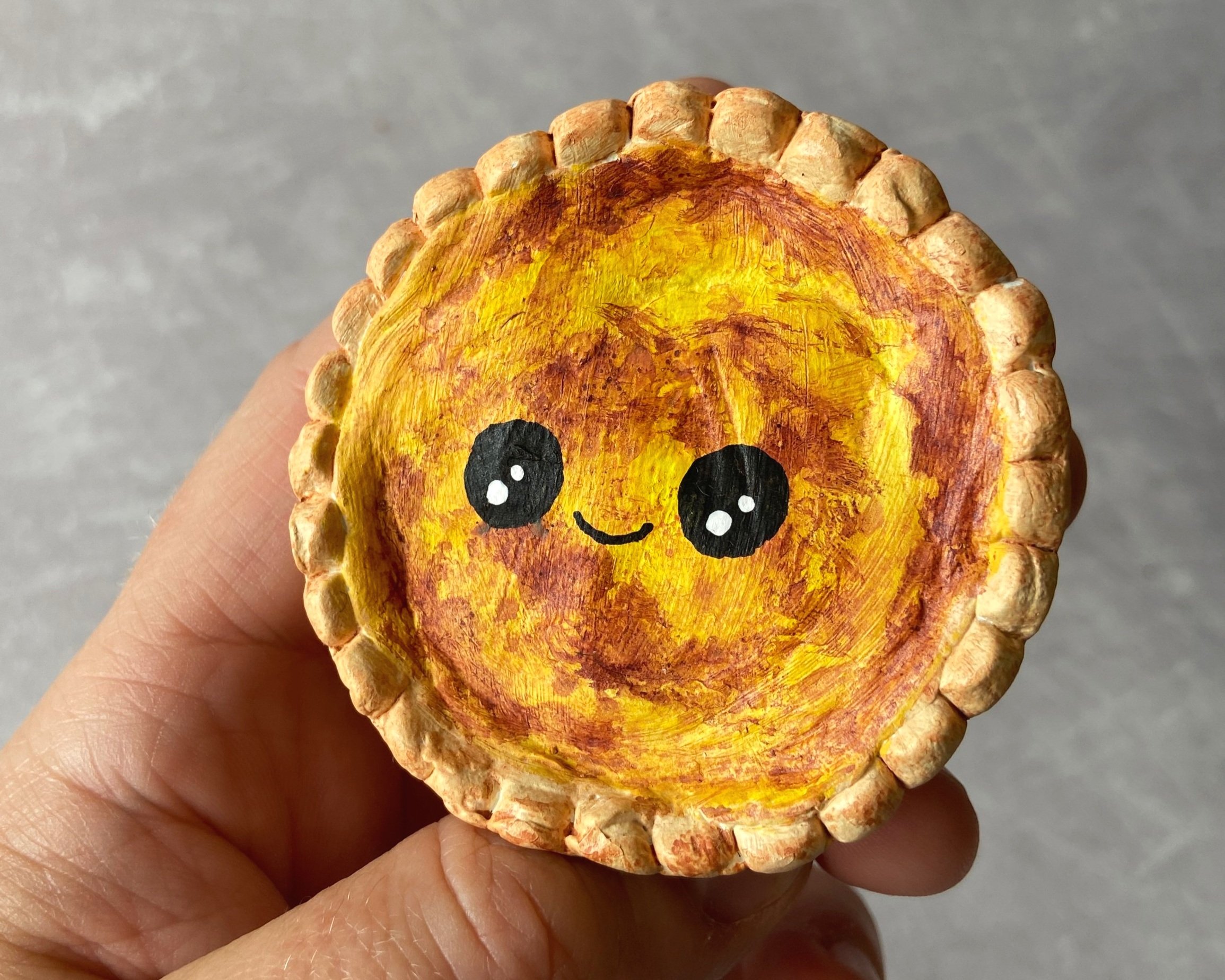 Egg custard tart cute clay character desk buddy handmade by Devon artist Helen Leslie Illustrator