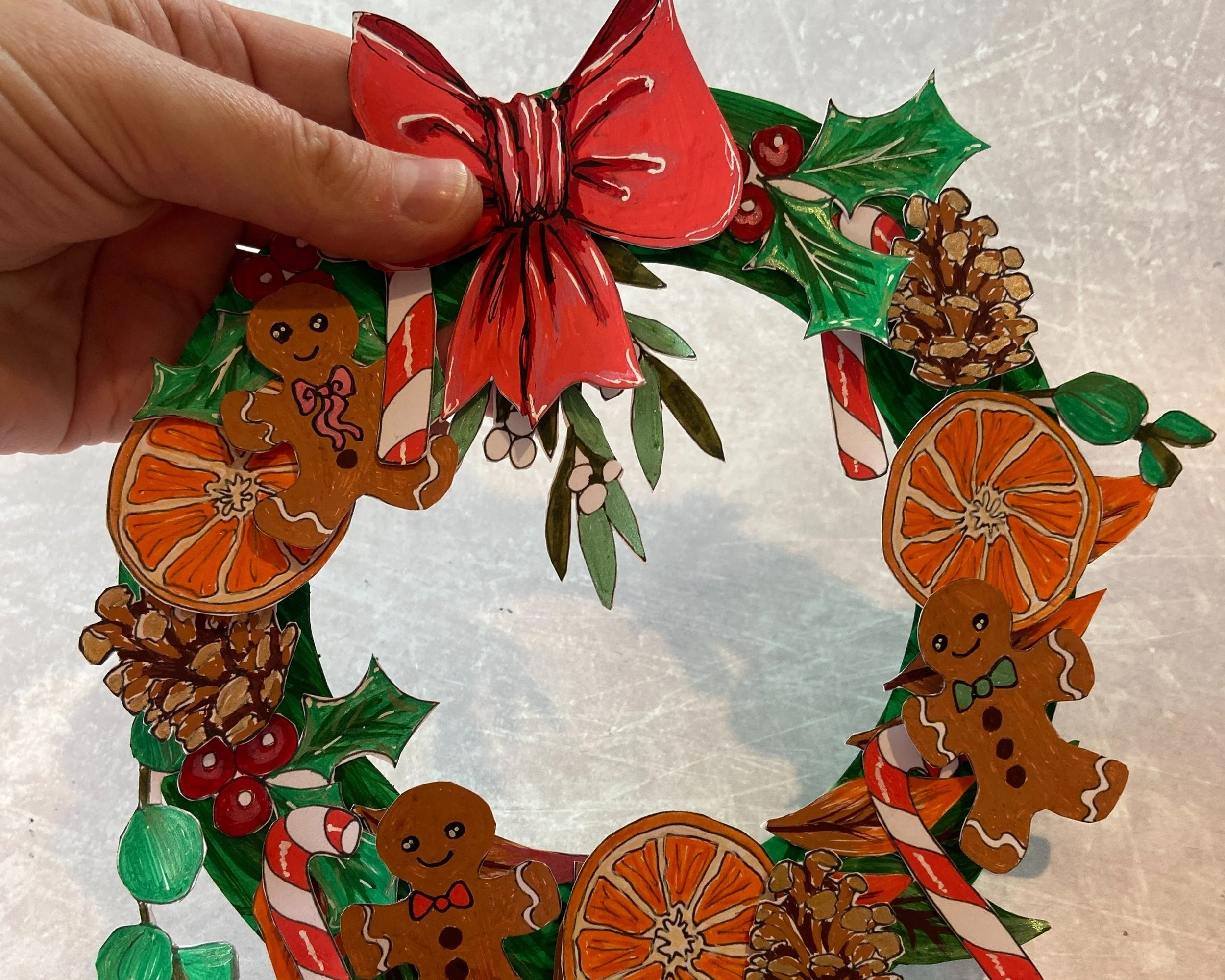 Make your own Christmas wreath papercraft activity by Helen Leslie Illustrator