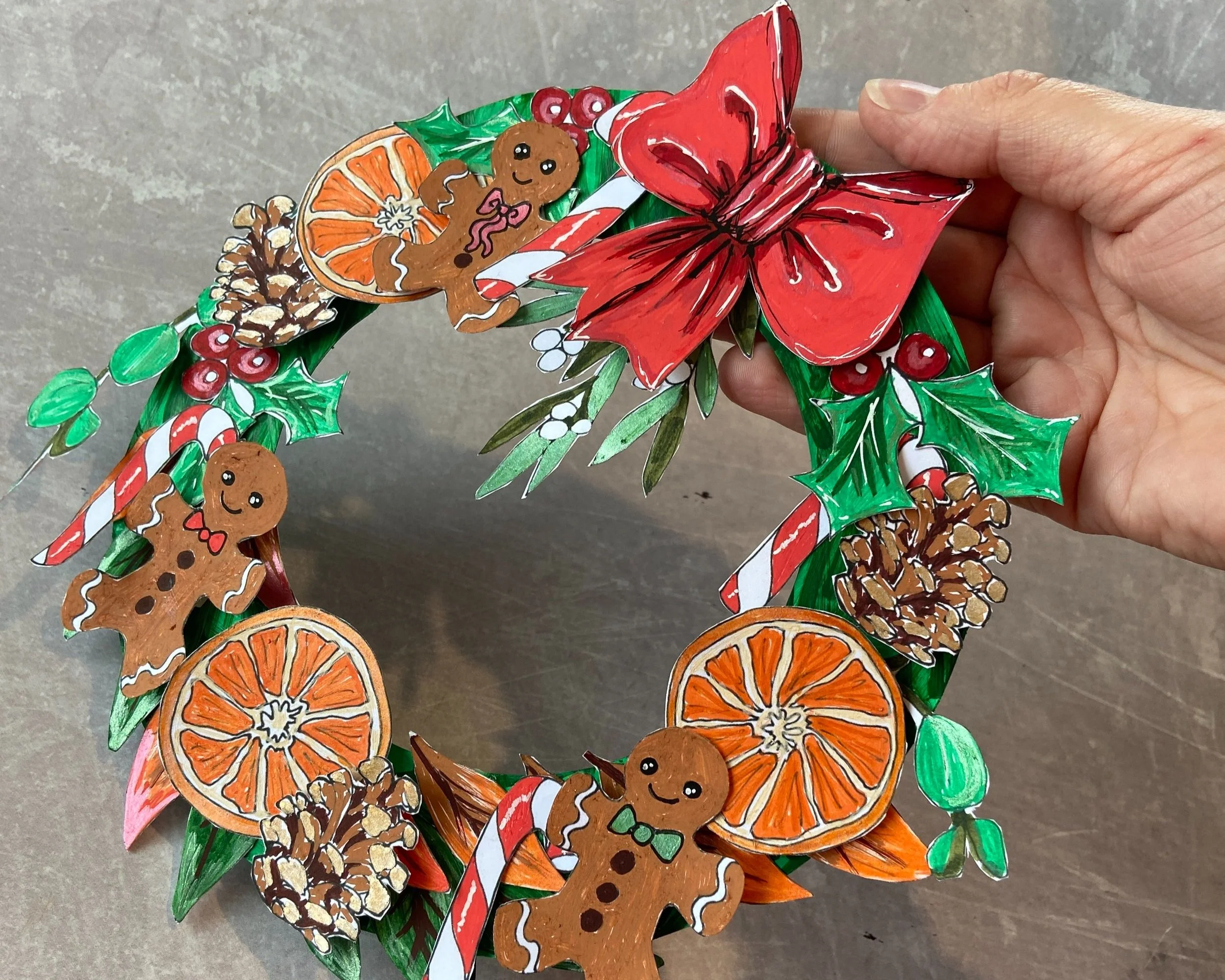 Make your own Christmas wreath papercraft activity by Helen Leslie Illustrator
