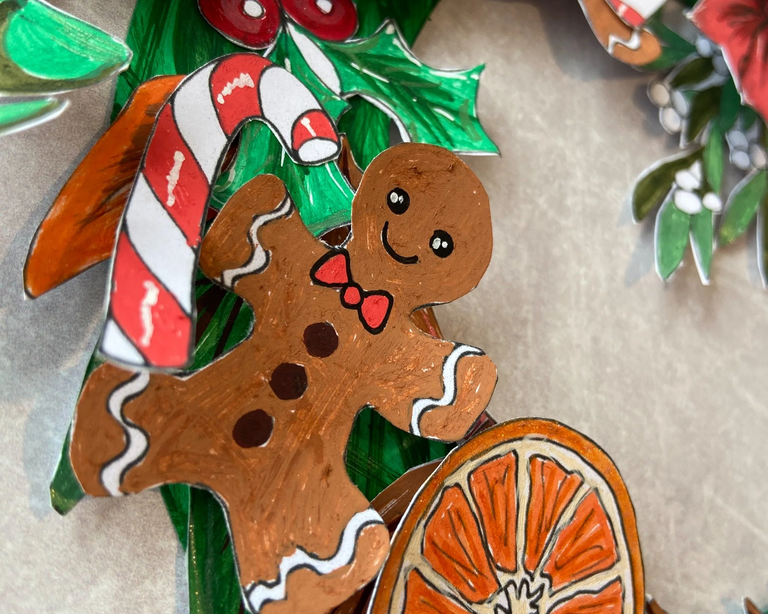 Make your own Christmas wreath papercraft activity by Helen Leslie Illustrator
