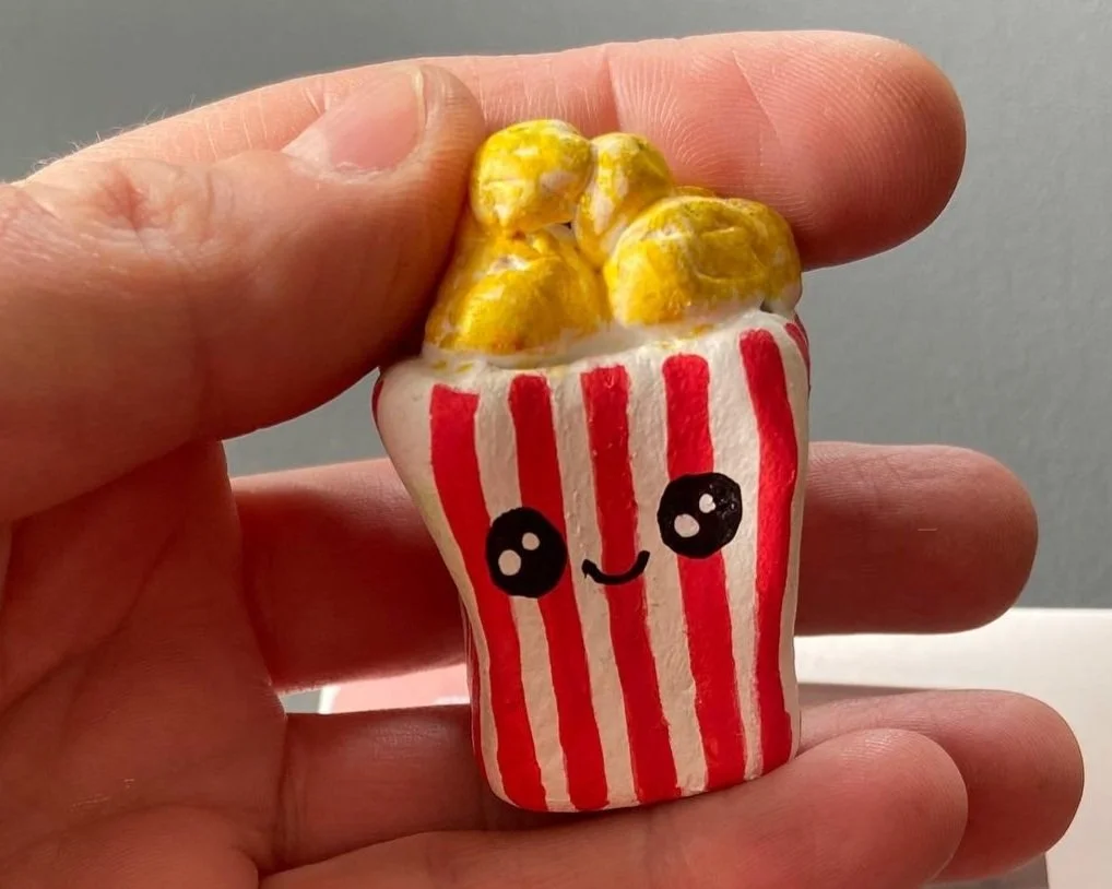 Popcorn cute clay character desk buddy handmade by Devon artist Helen Leslie Illustrator